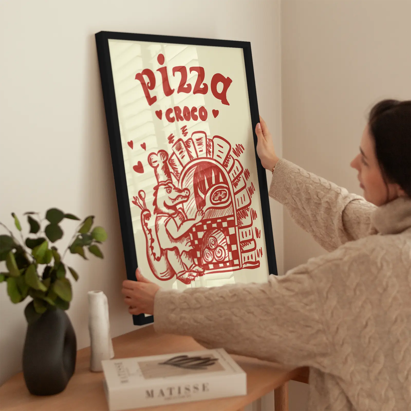Pizza Croco wird aufgehängt