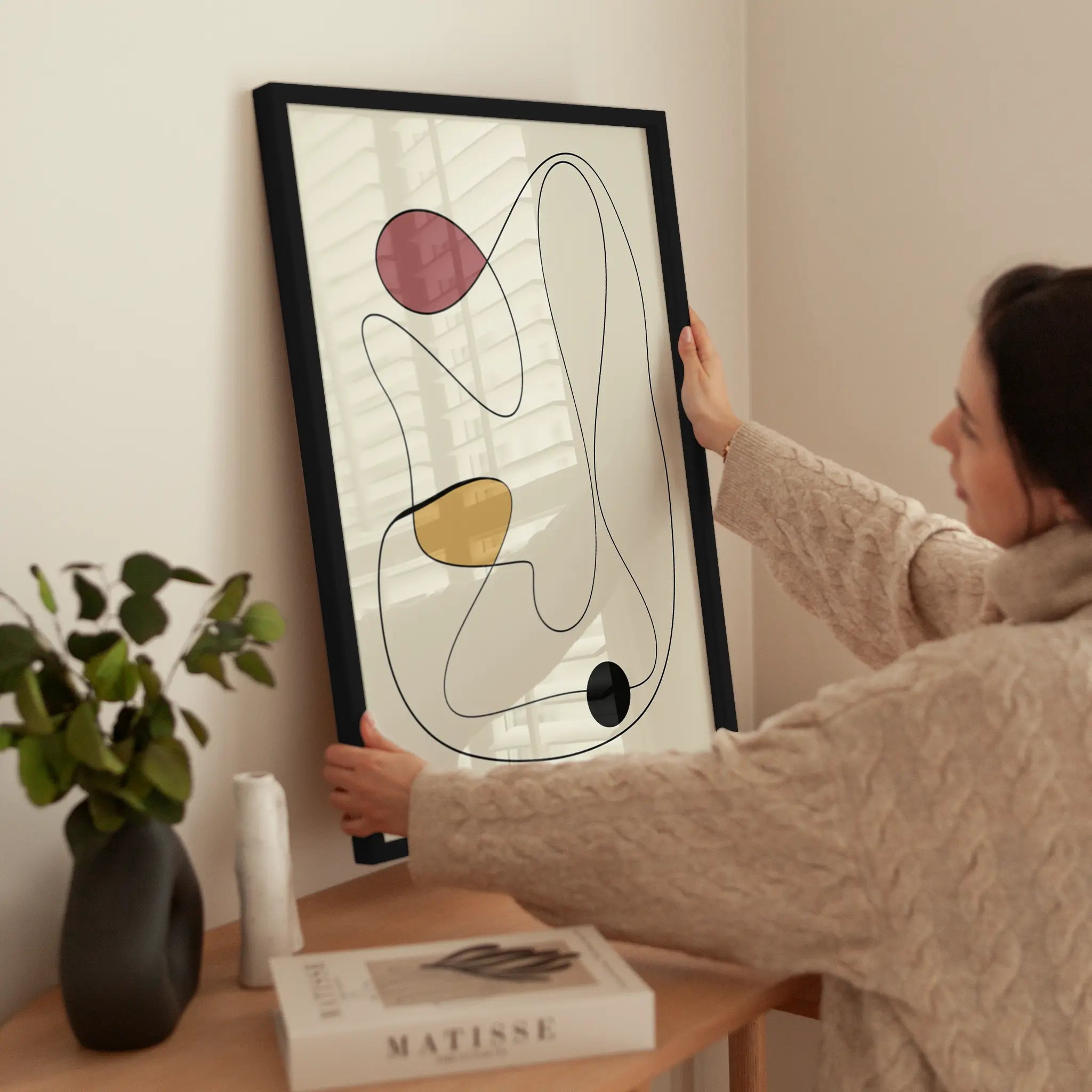 Abstract Colorful Shapes wird aufgehängt