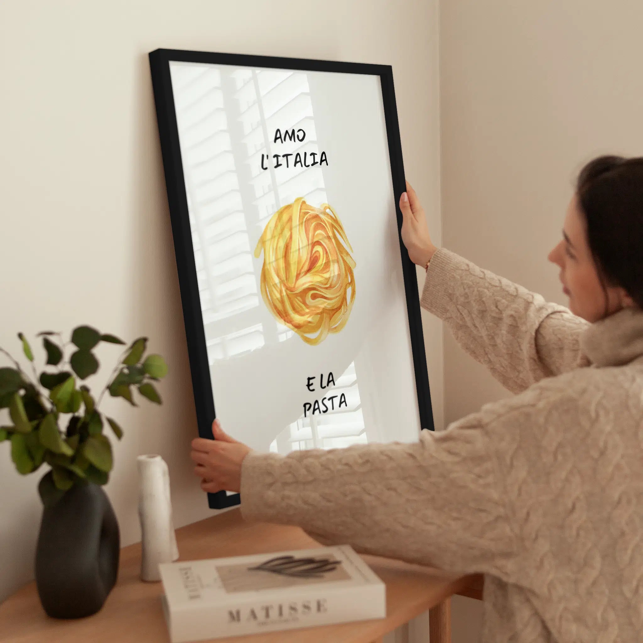 Amo L'Italia e La Pasta wird aufgehängt