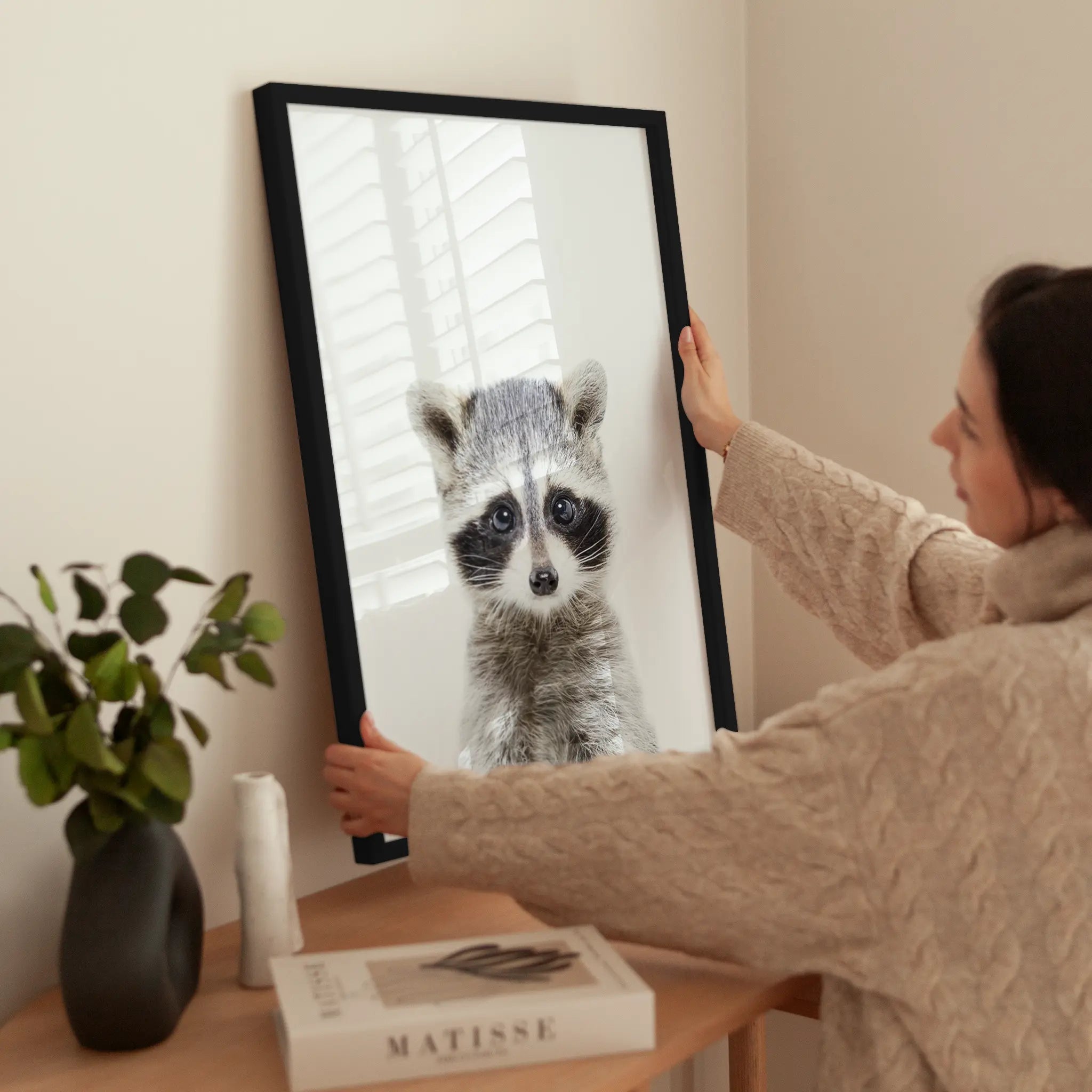 Baby Racoon wird aufgehängt