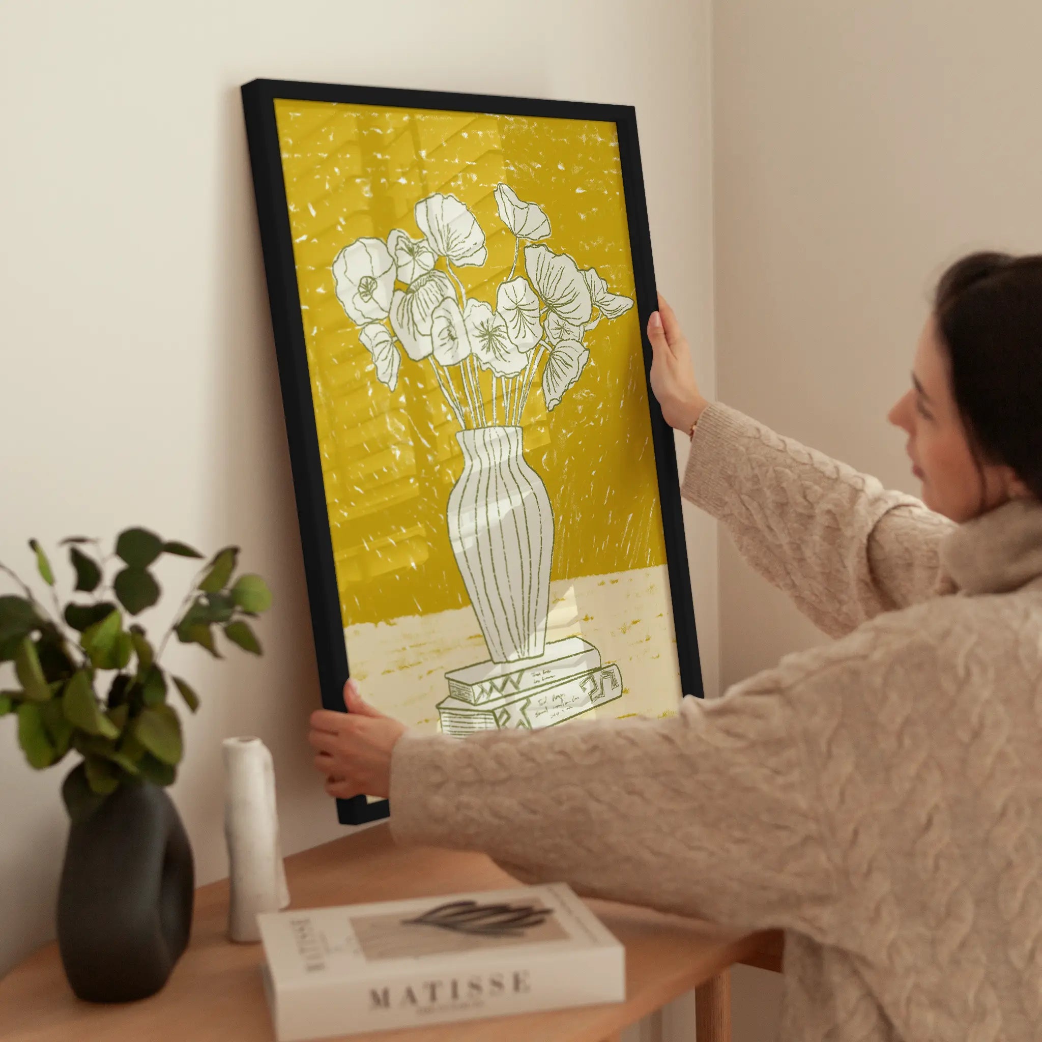 Books and Flowers wird aufgehängt