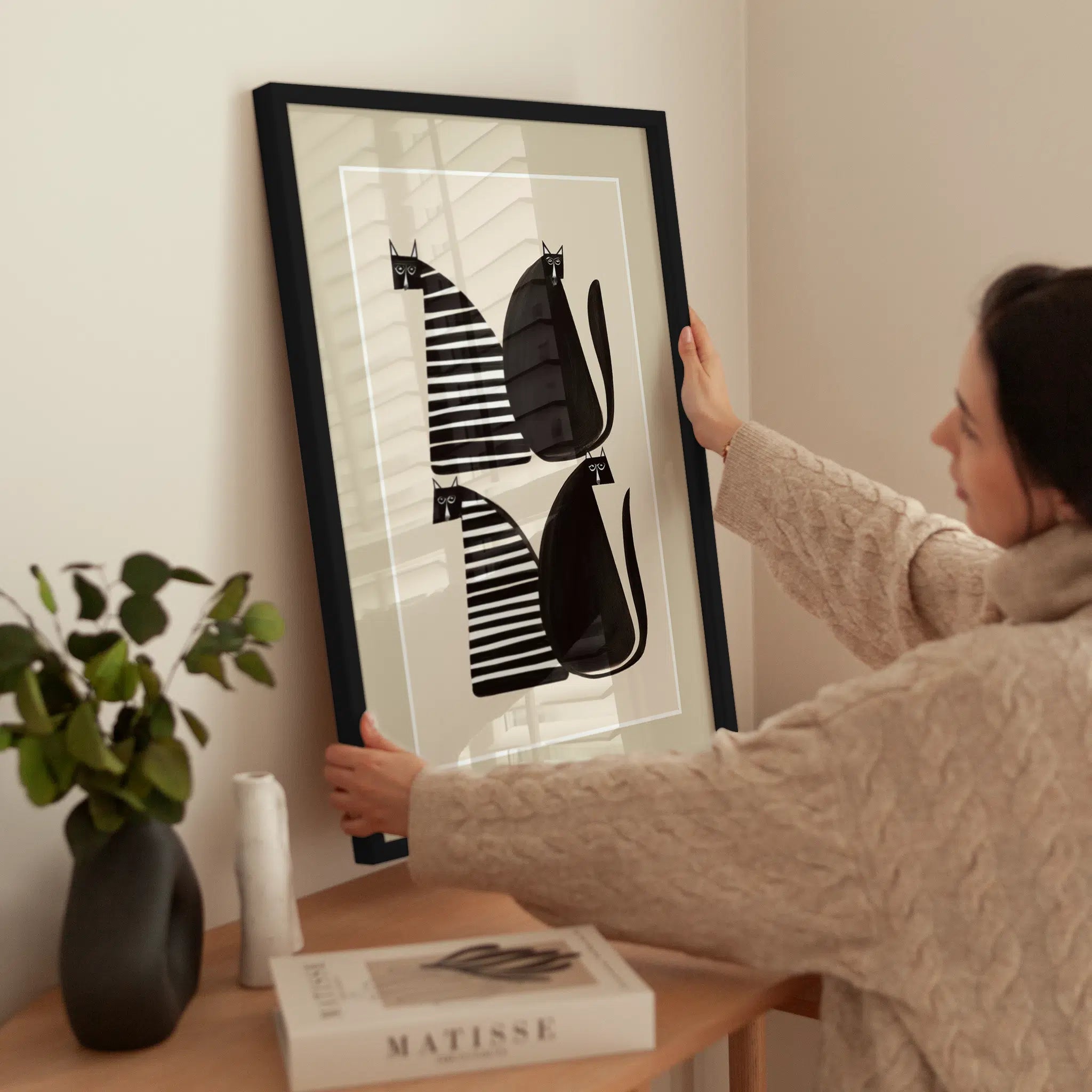 Cats in Stripes wird aufgehängt