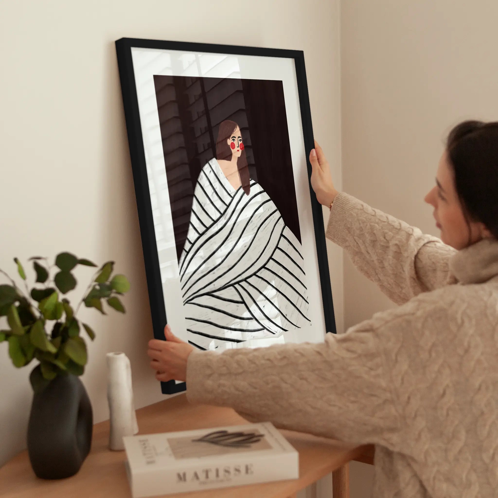 The Woman With Black and White Stripes wird aufgehängt