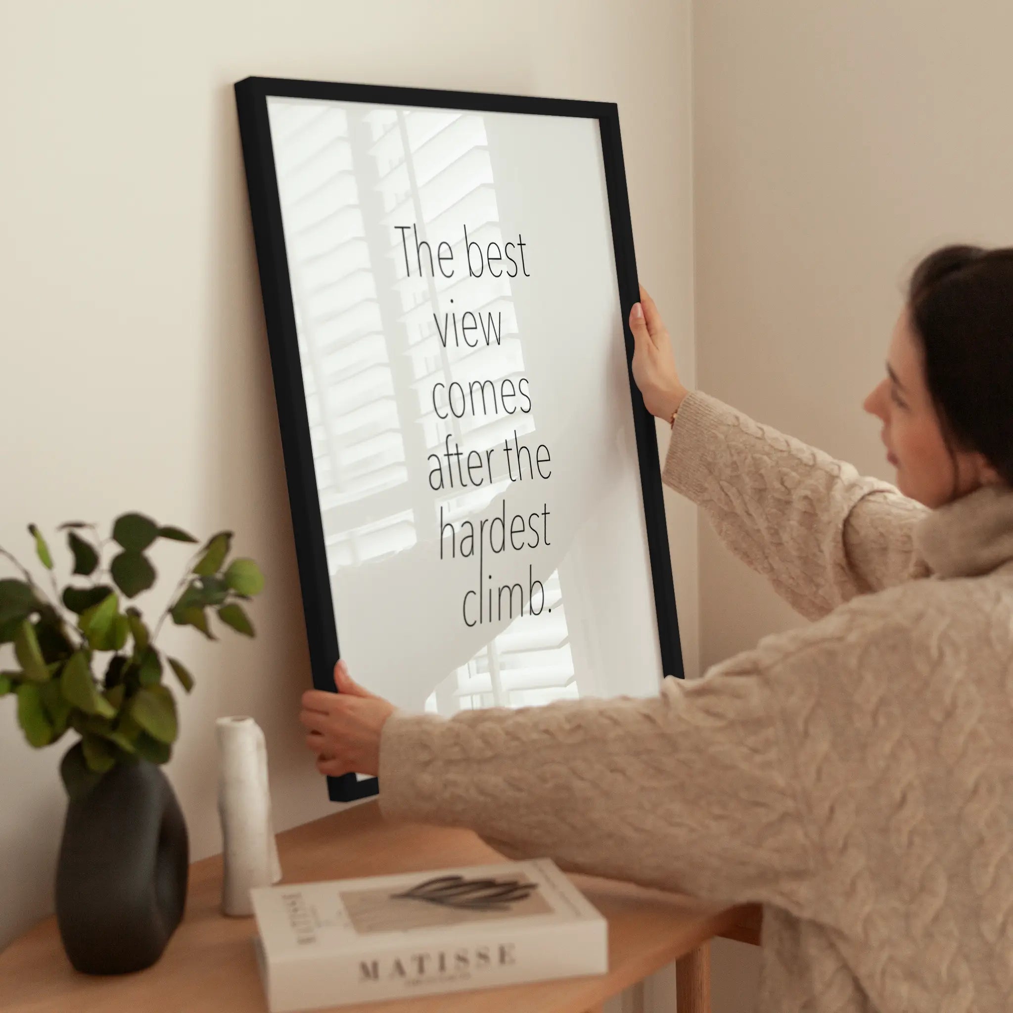 The Best View Comes After The Hardest Climb wird aufgehängt