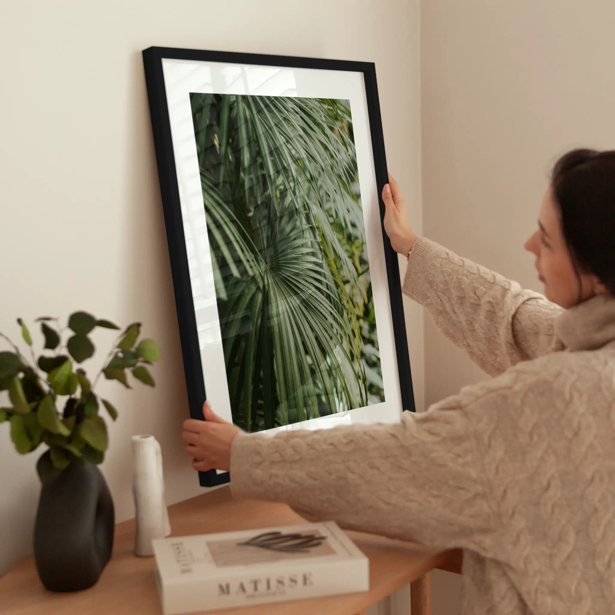 Palm Leaves wird aufgehängt