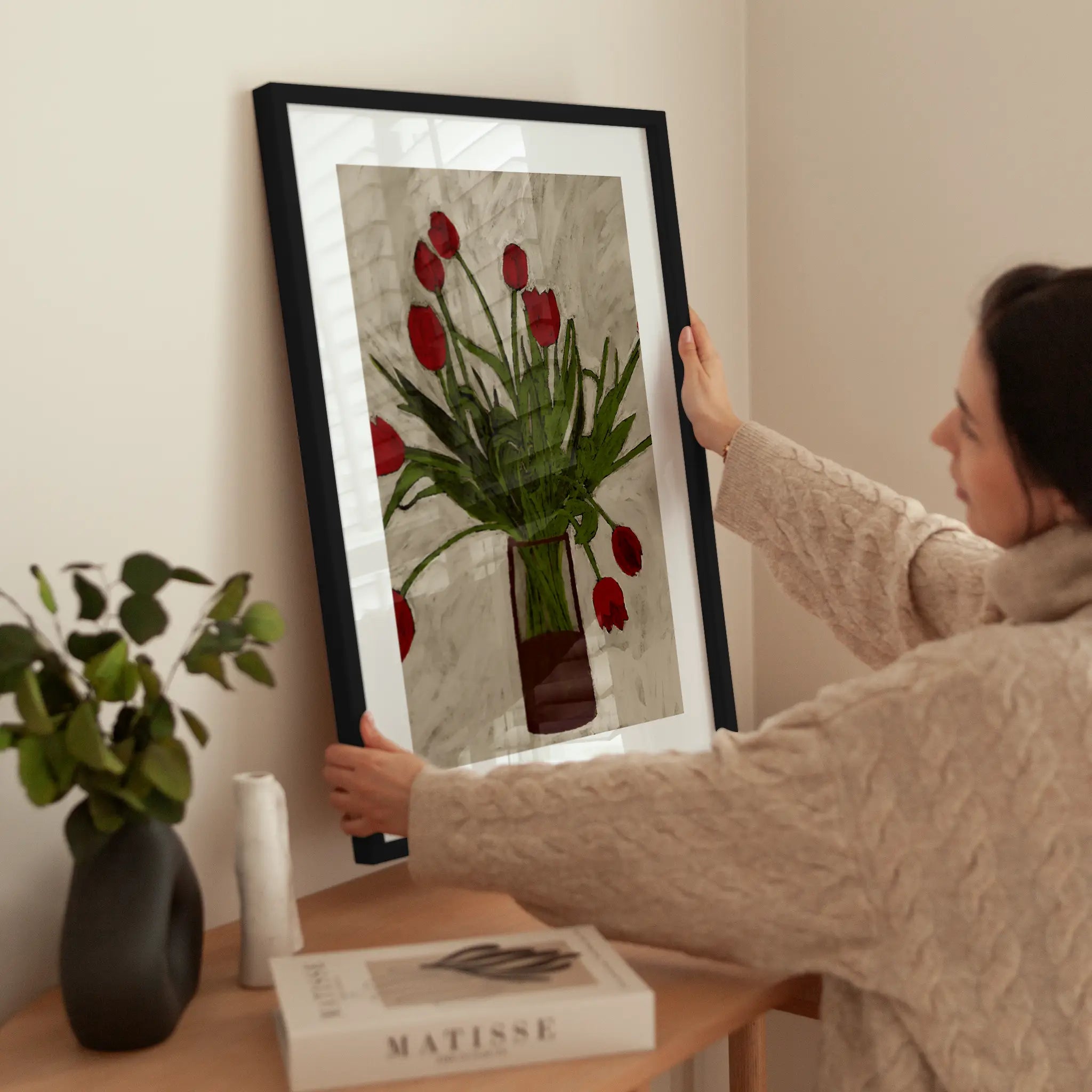 Red Tulips on Gray wird aufgehängt