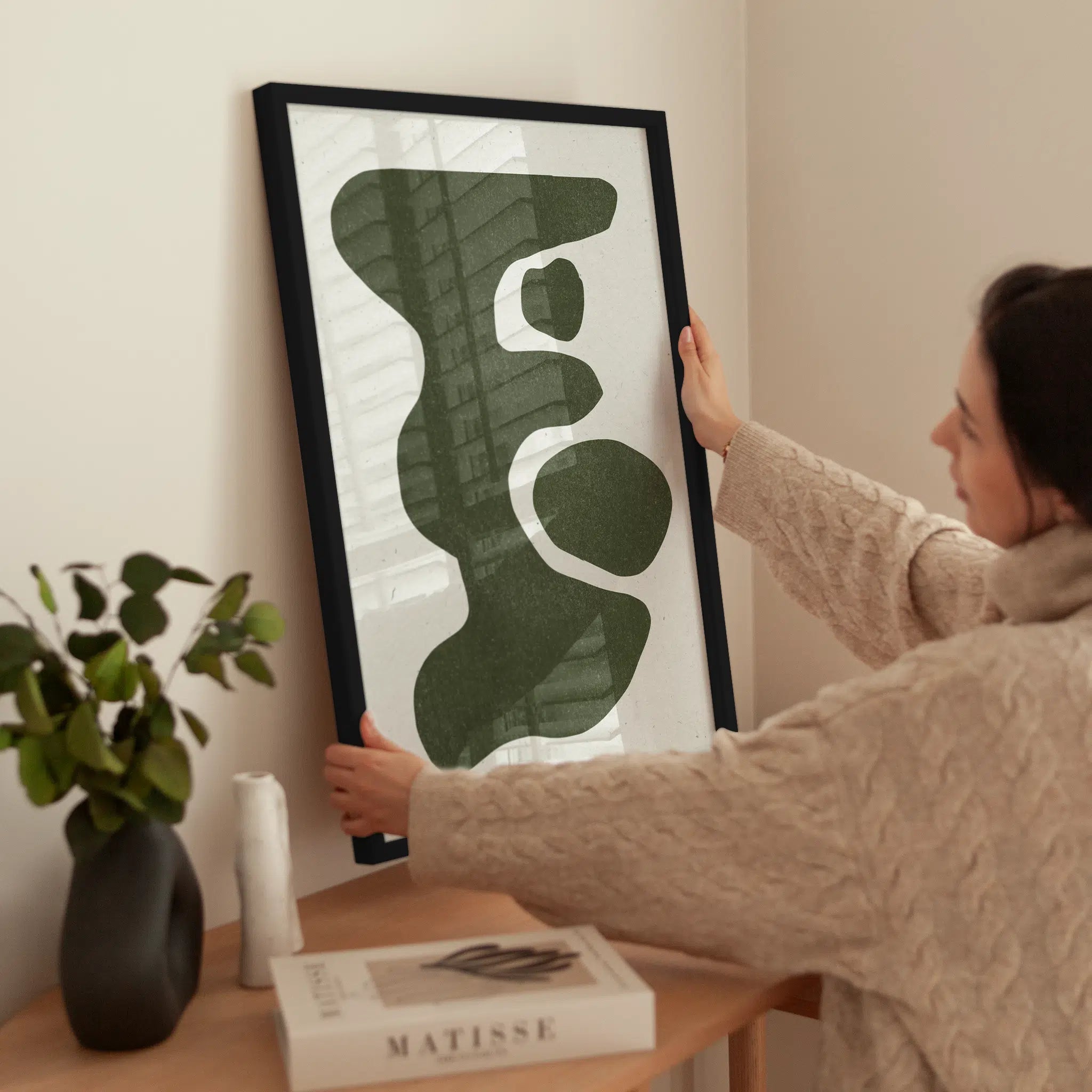 Soft Green Shapes wird aufgehängt