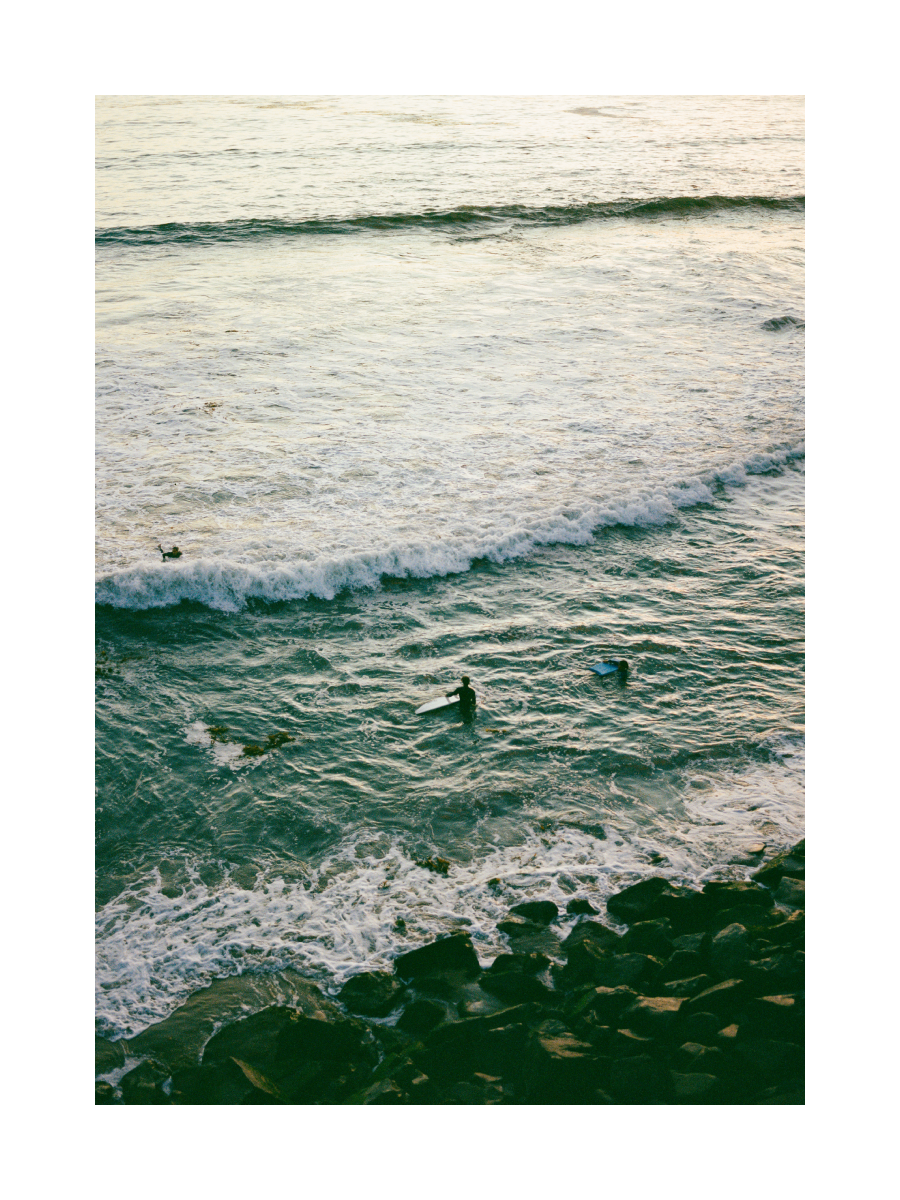 Surfers in the Water Poster