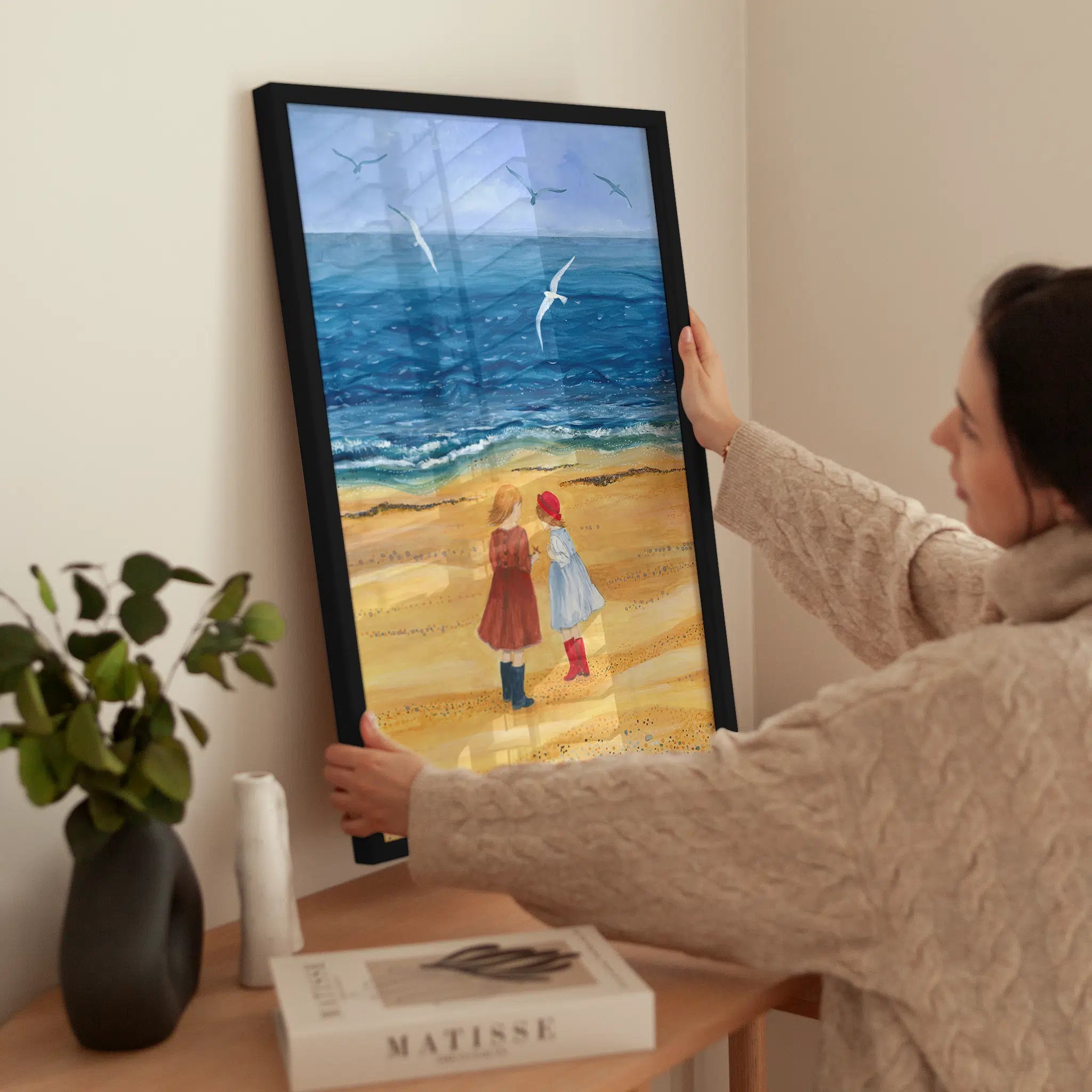 Two Girls at the Beach wird aufgehängt