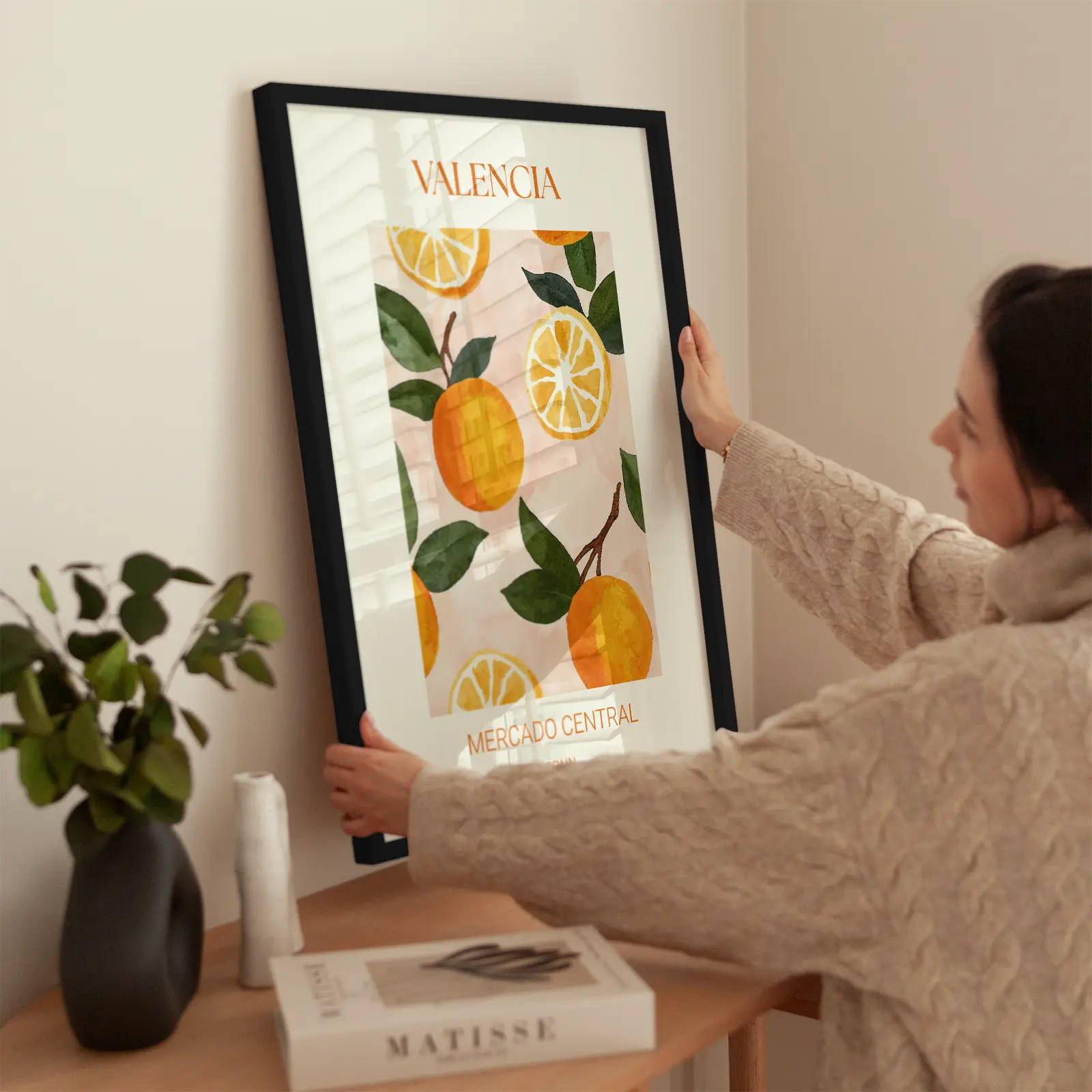 Valencia Oranges wird aufgehängt