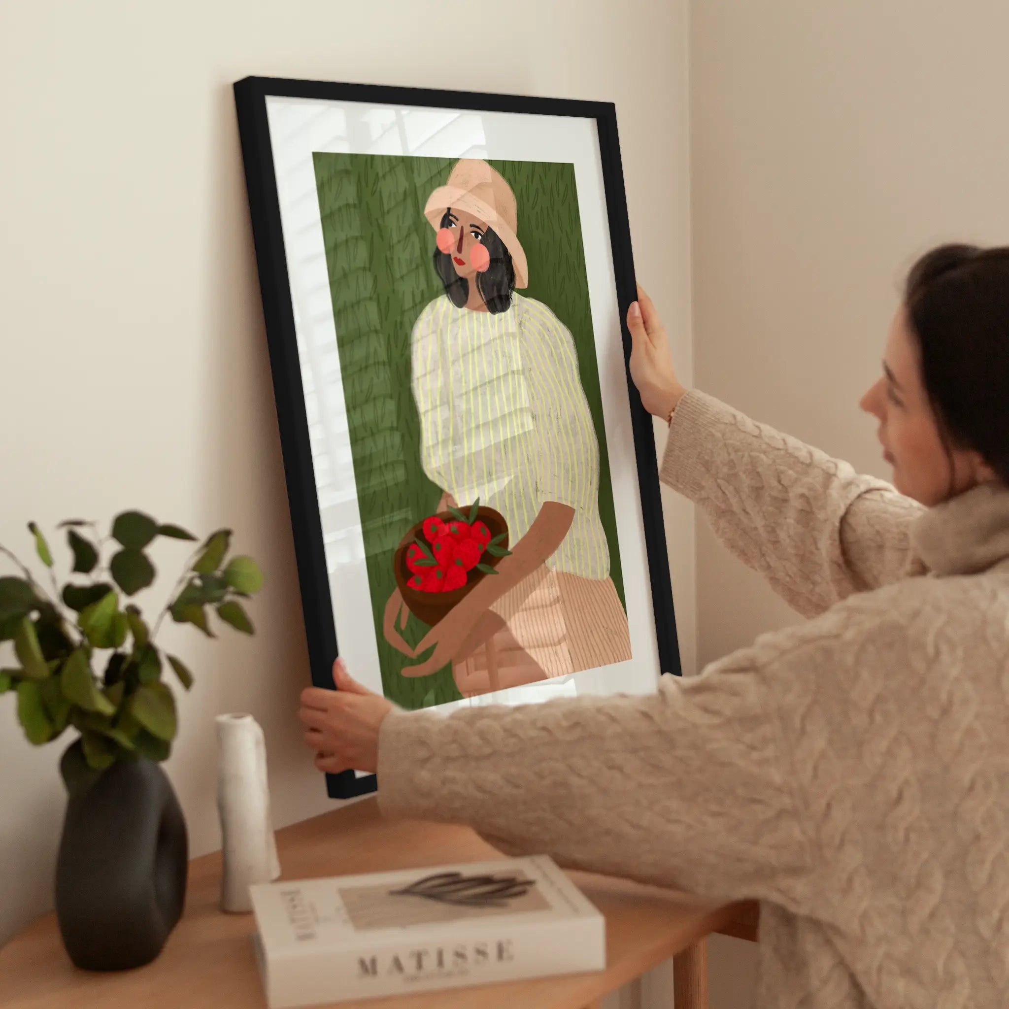 Woman with Strawberries wird aufgehängt