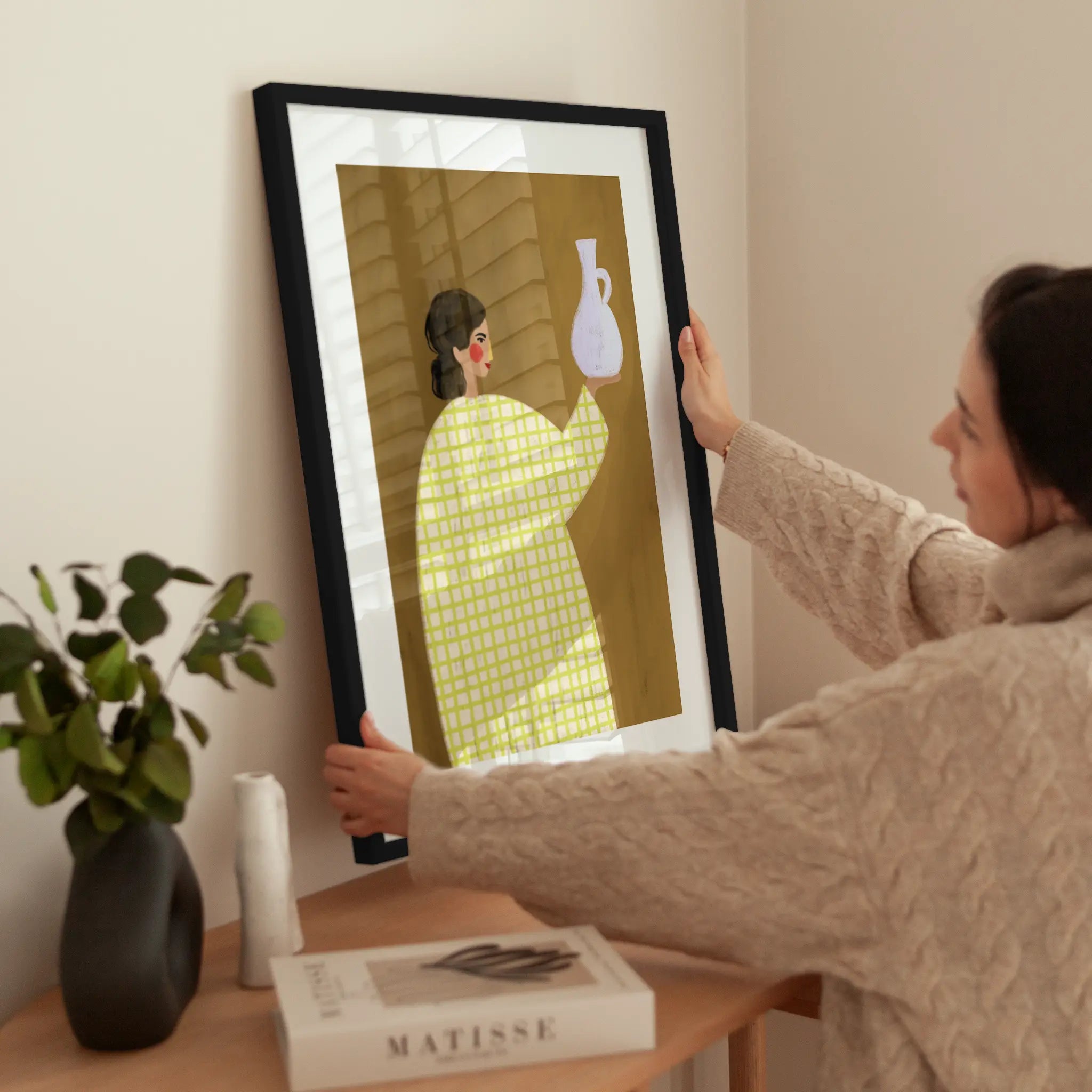 The Woman With Vase wird aufgehängt