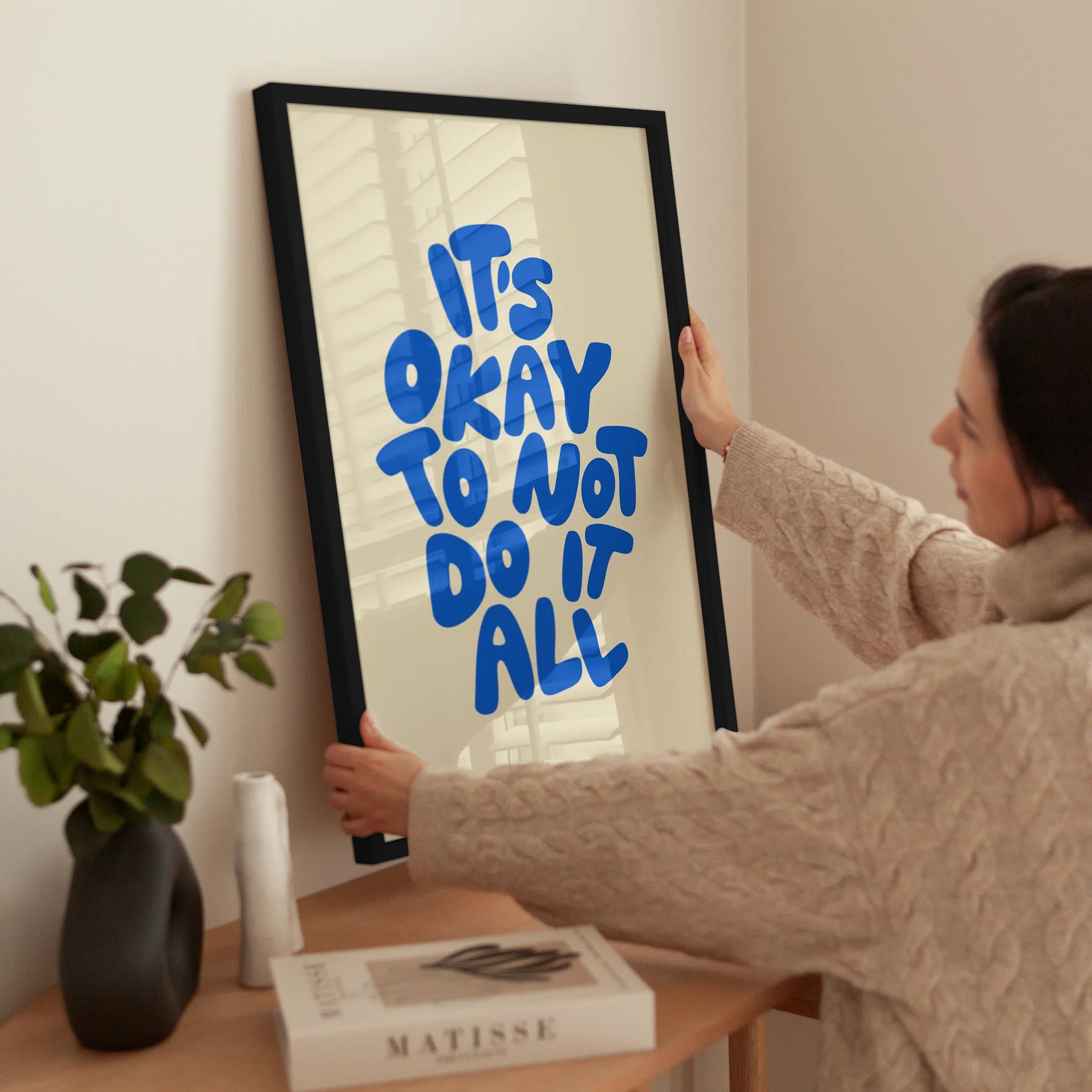 It's Okay To Not Do It All wird aufgehängt