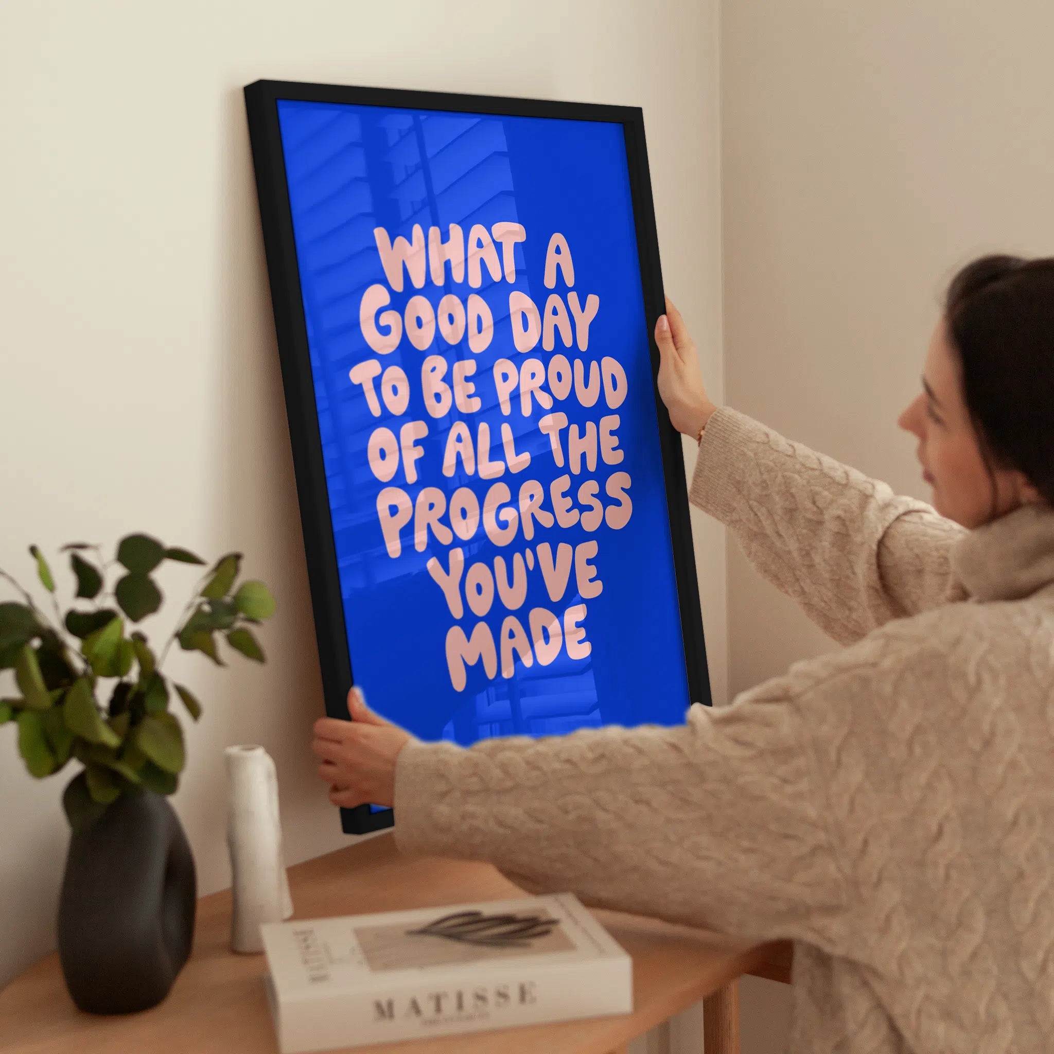 What a Good Day To Be Proud of All the Progress You've Made wird aufgehängt