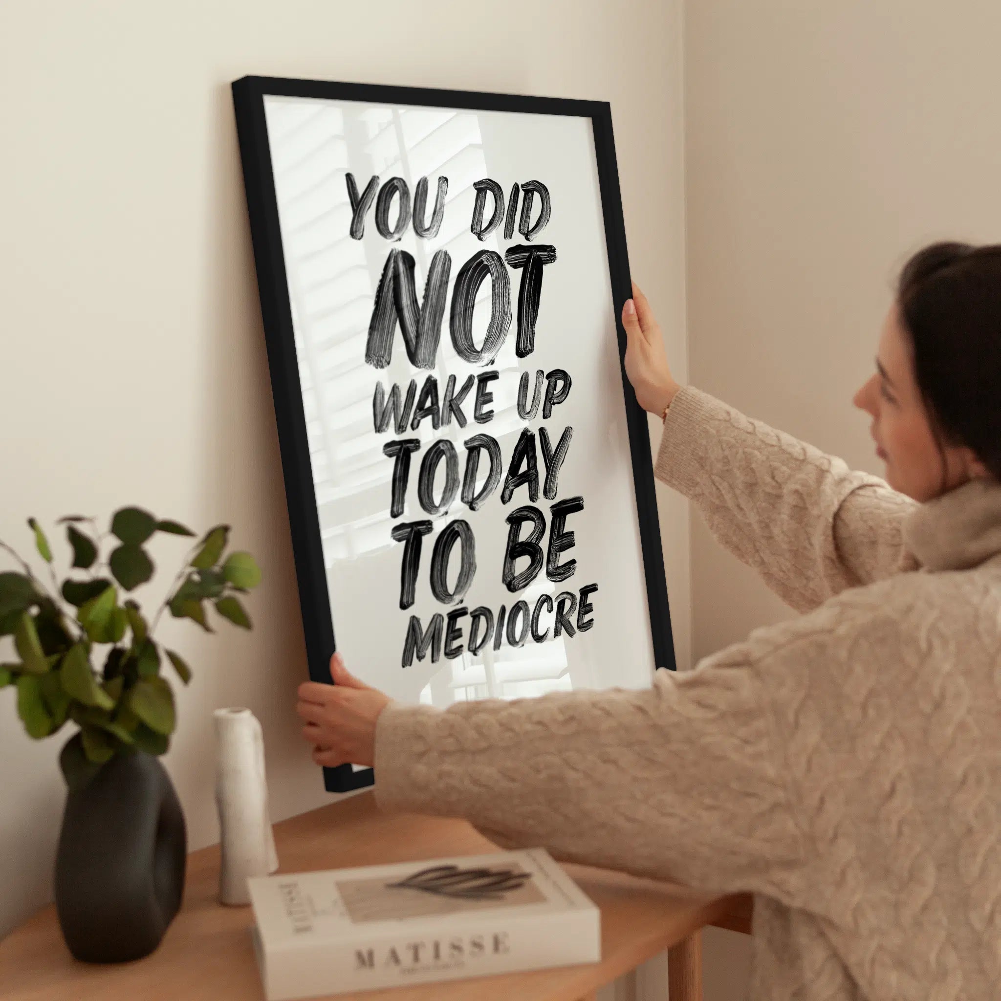 You Did Not Wake Up Today To Be Mediocre wird aufgehängt