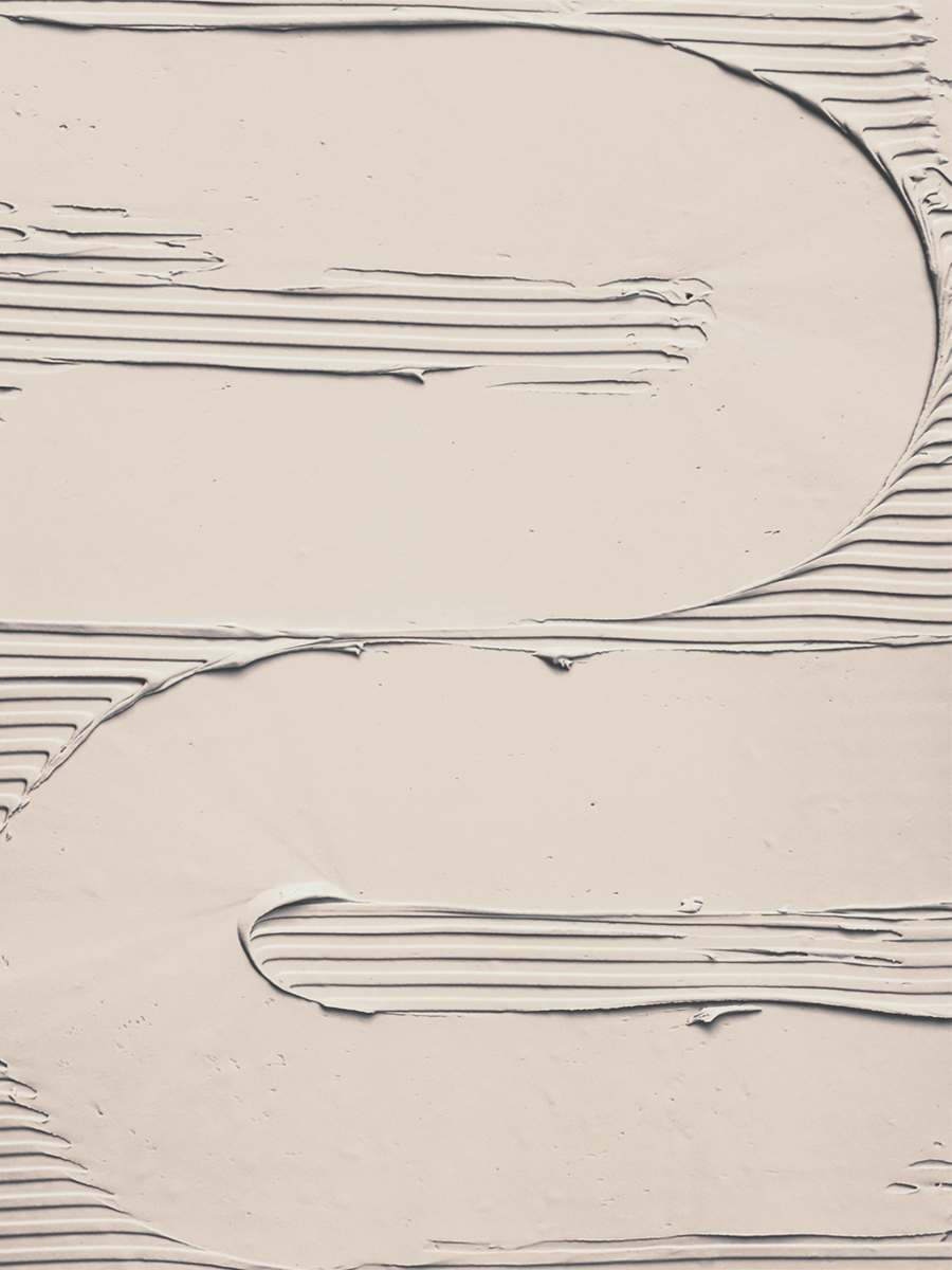 Beiges Gipsmuster mit wellenförmigem Design.