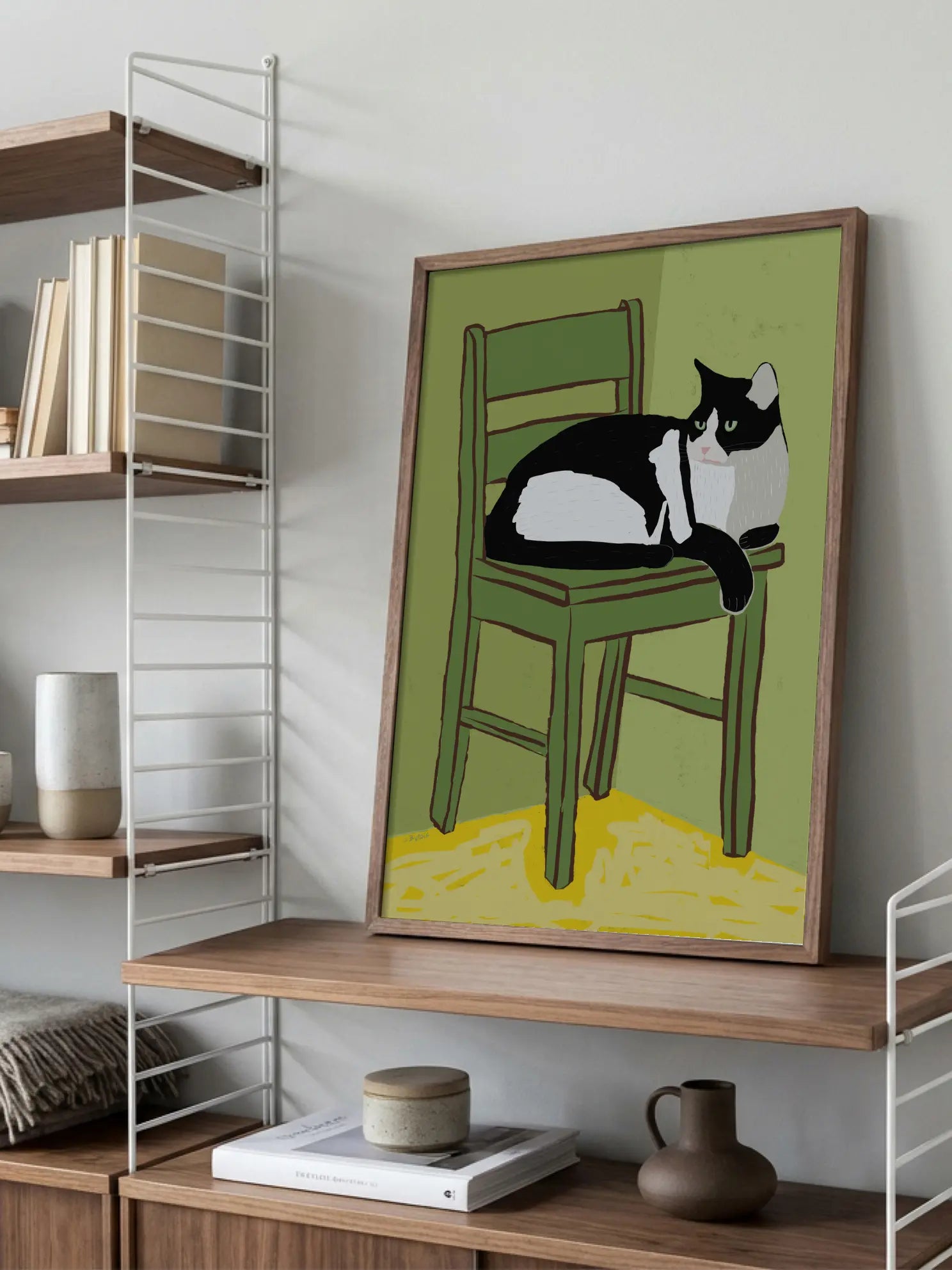 Cat On Green Chair Poster