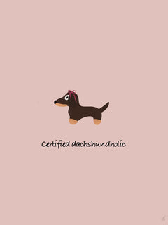 Poster mit einem Dackel und dem Text "Certified Dachshundholic" auf rosa Hintergrund.