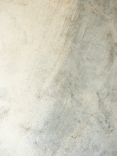 Poster mit Betonstruktur in Grau und Beige.