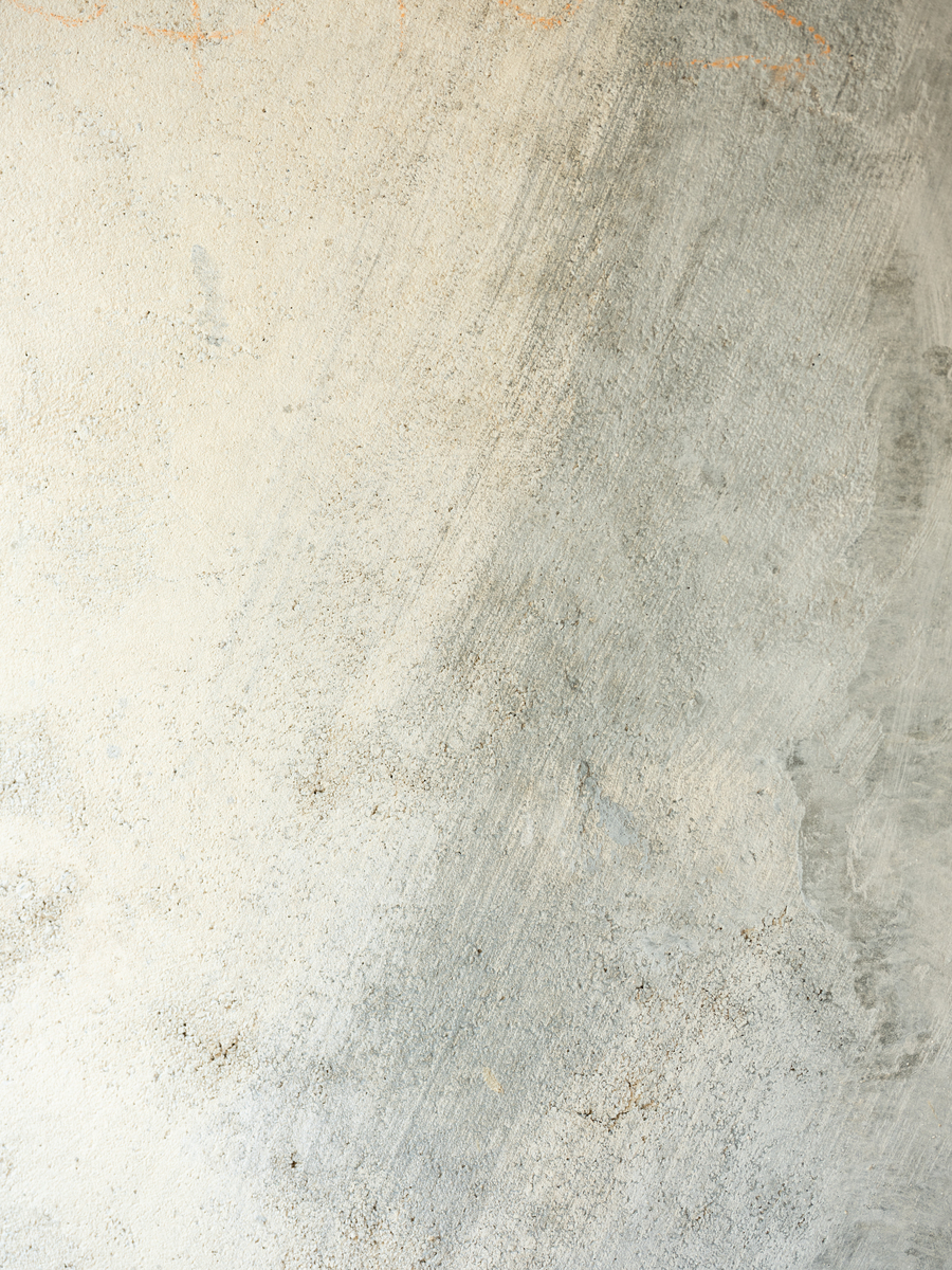 Poster mit Betonstruktur in Grau und Beige.