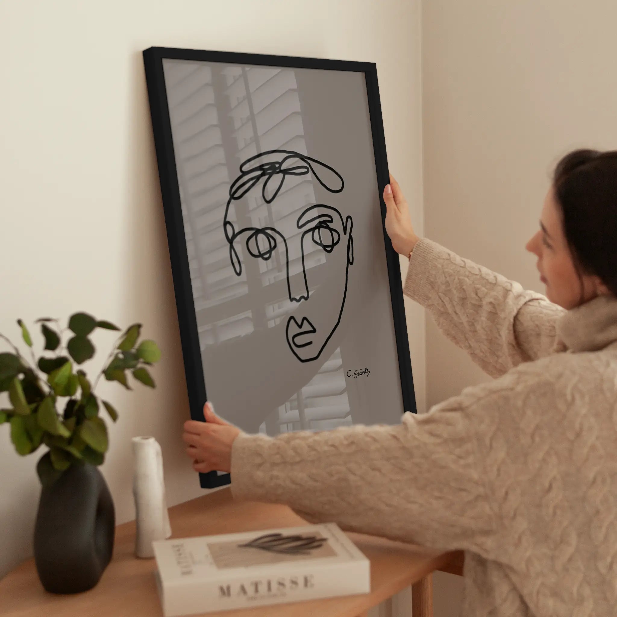 Face Line Art wird aufgehängt