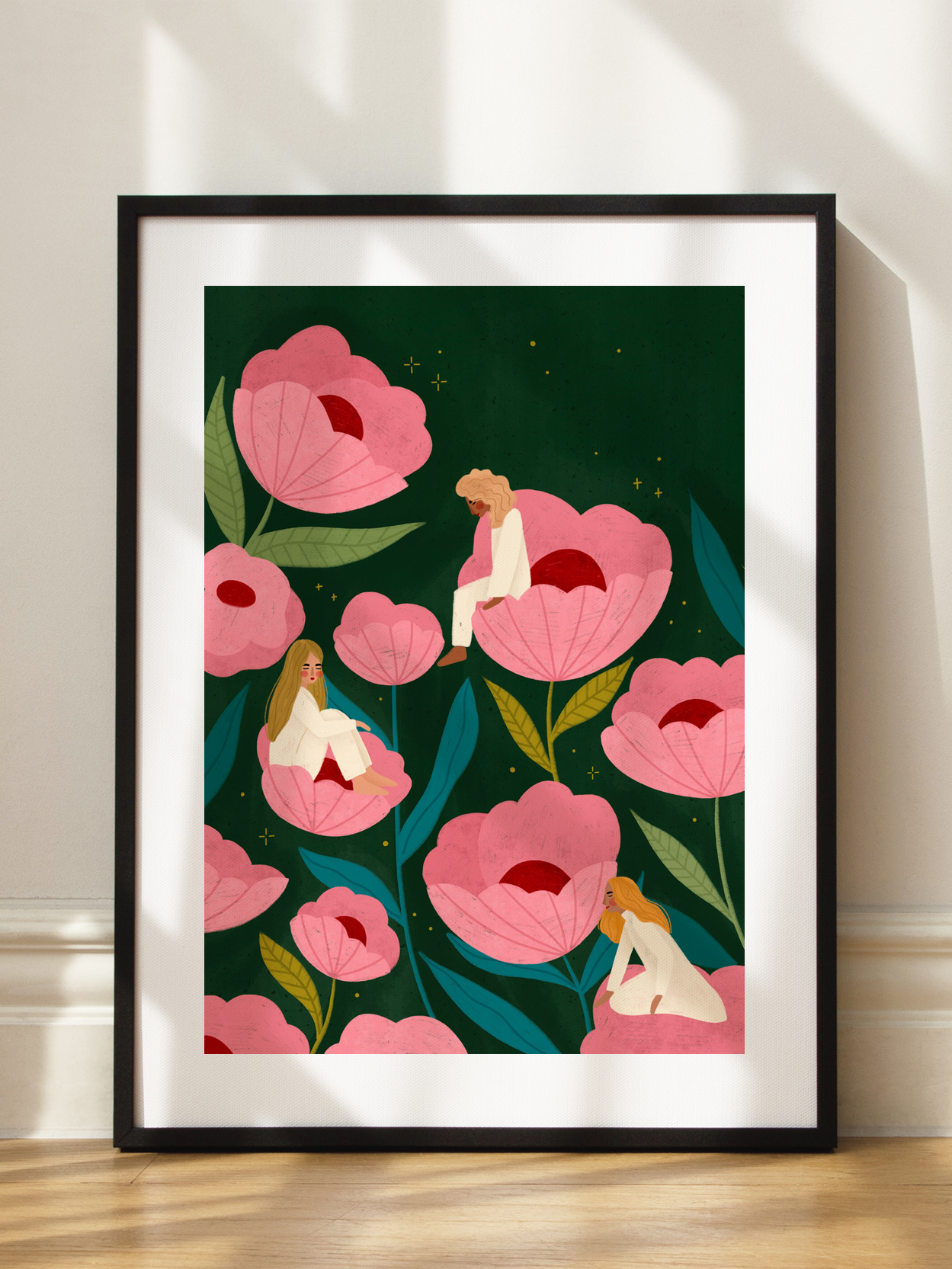 Three Women Sitting on Large Pink Flowers
