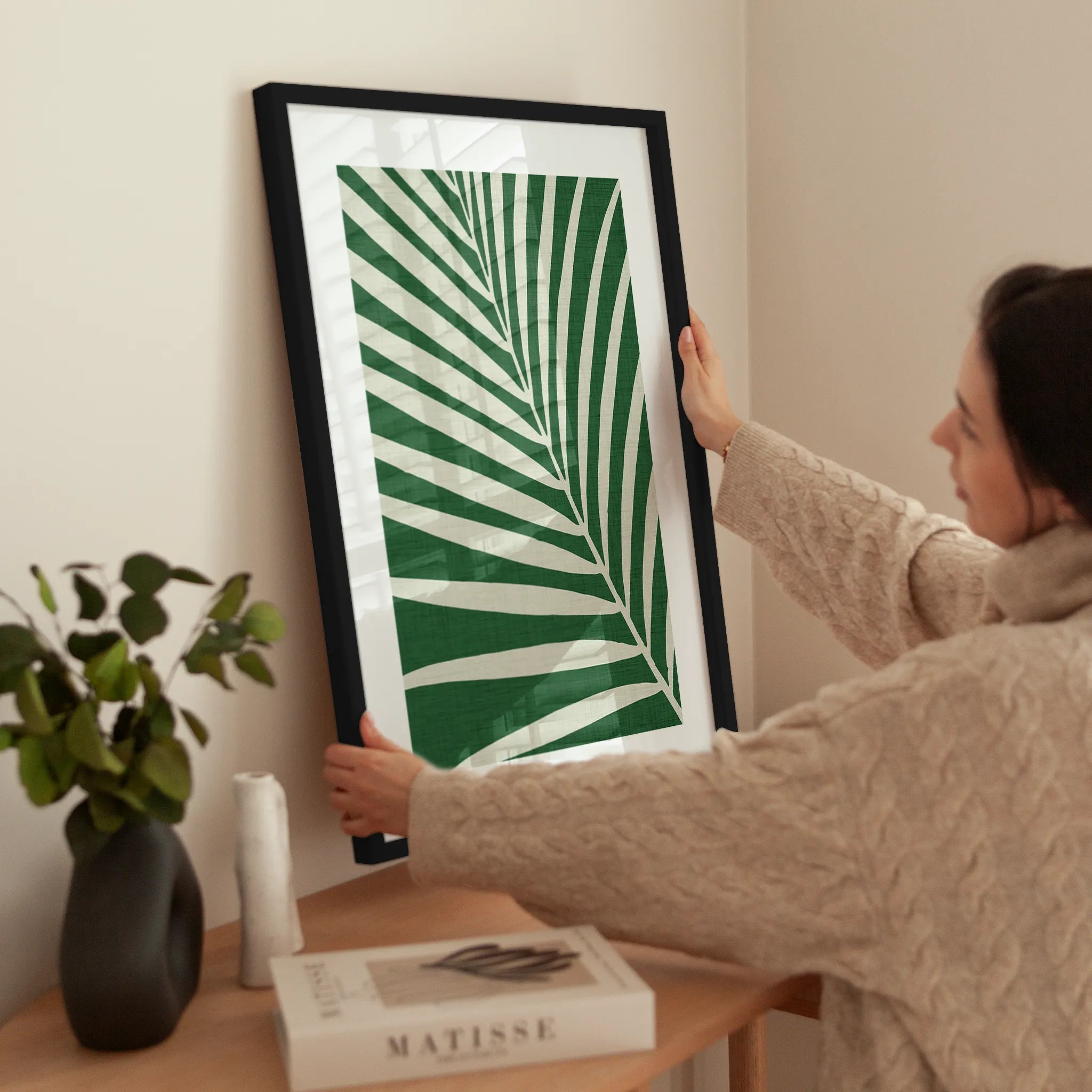 Graphic Green Leaf wird aufgehängt