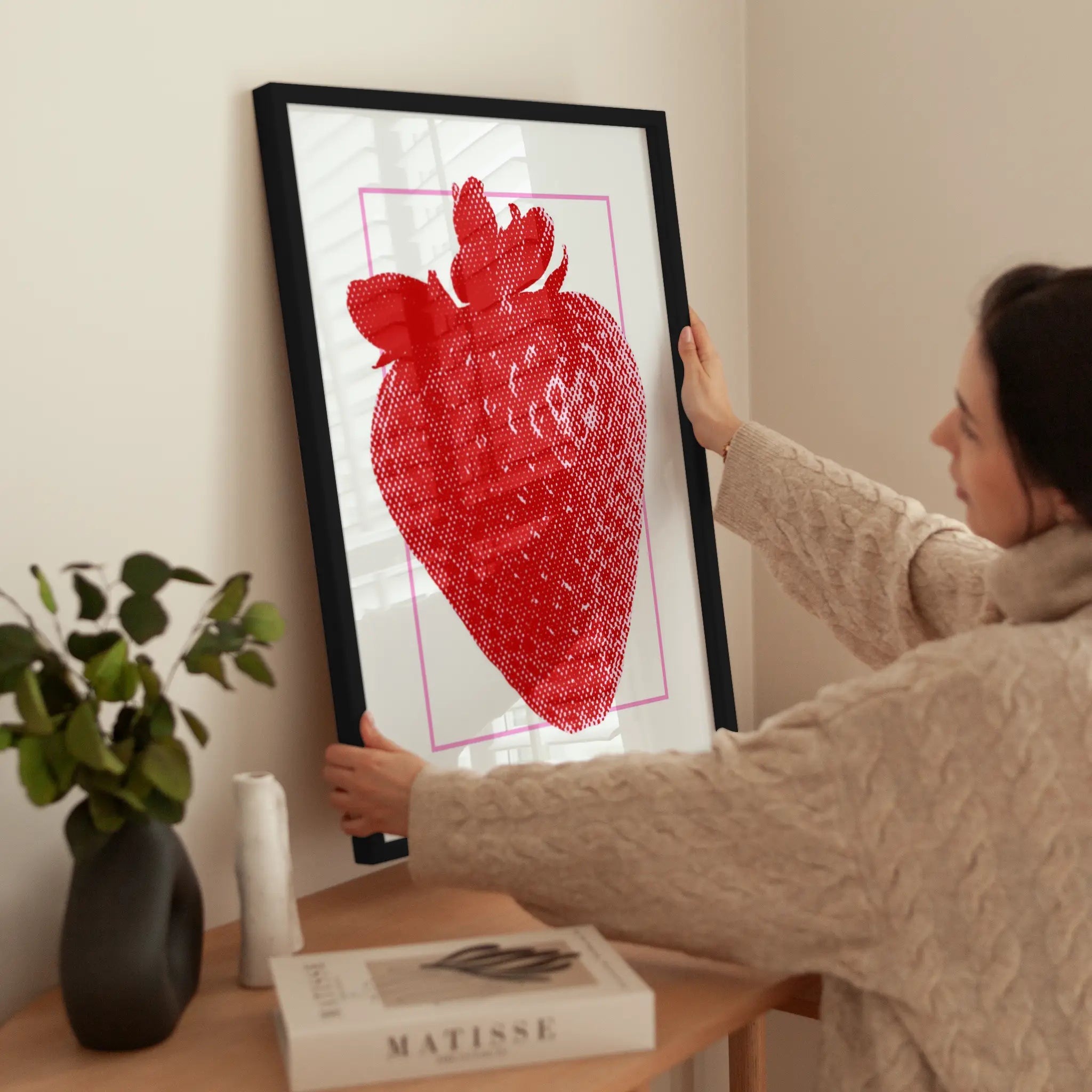 Graphic Strawberry wird aufgehängt