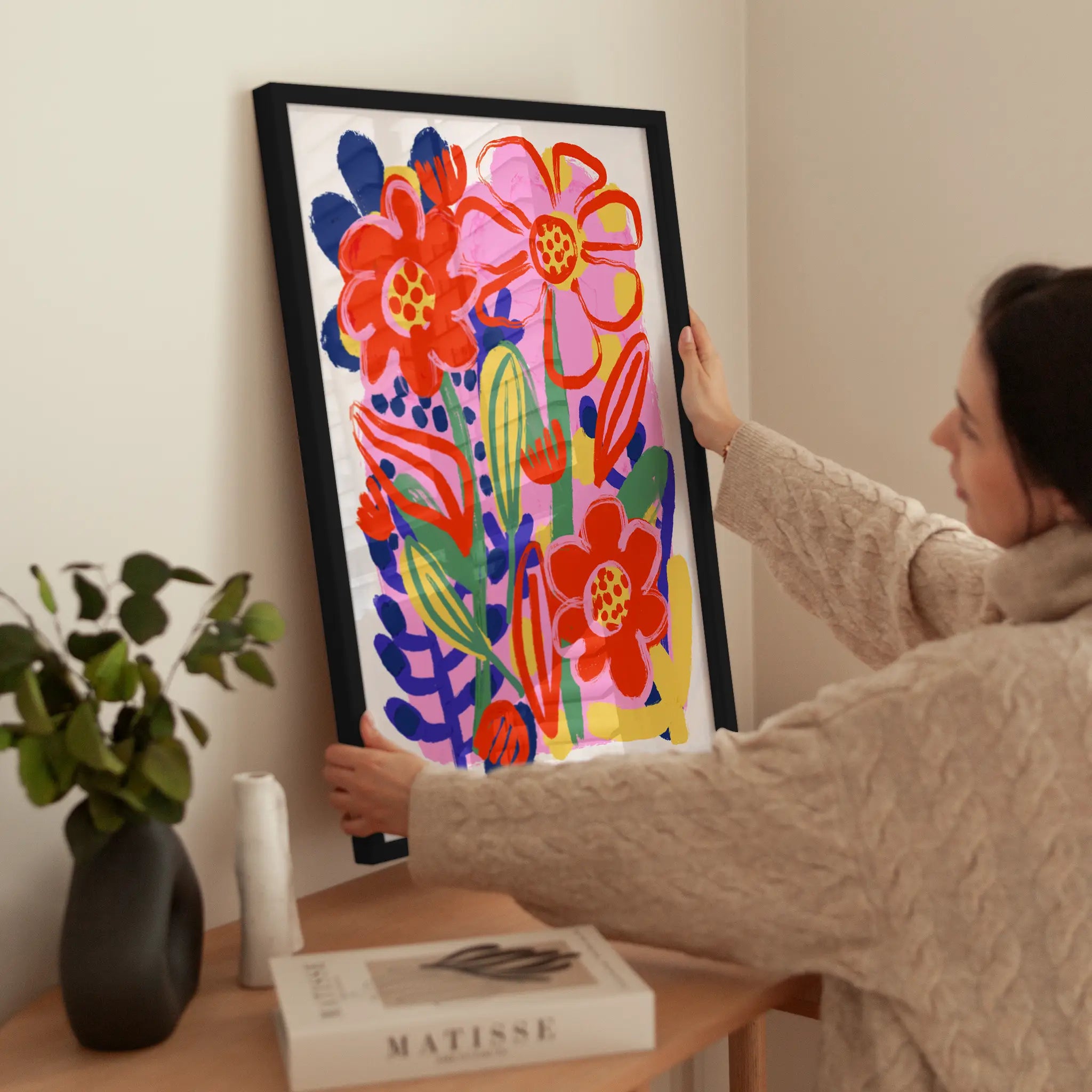 Handpainted Flowers wird aufgehängt