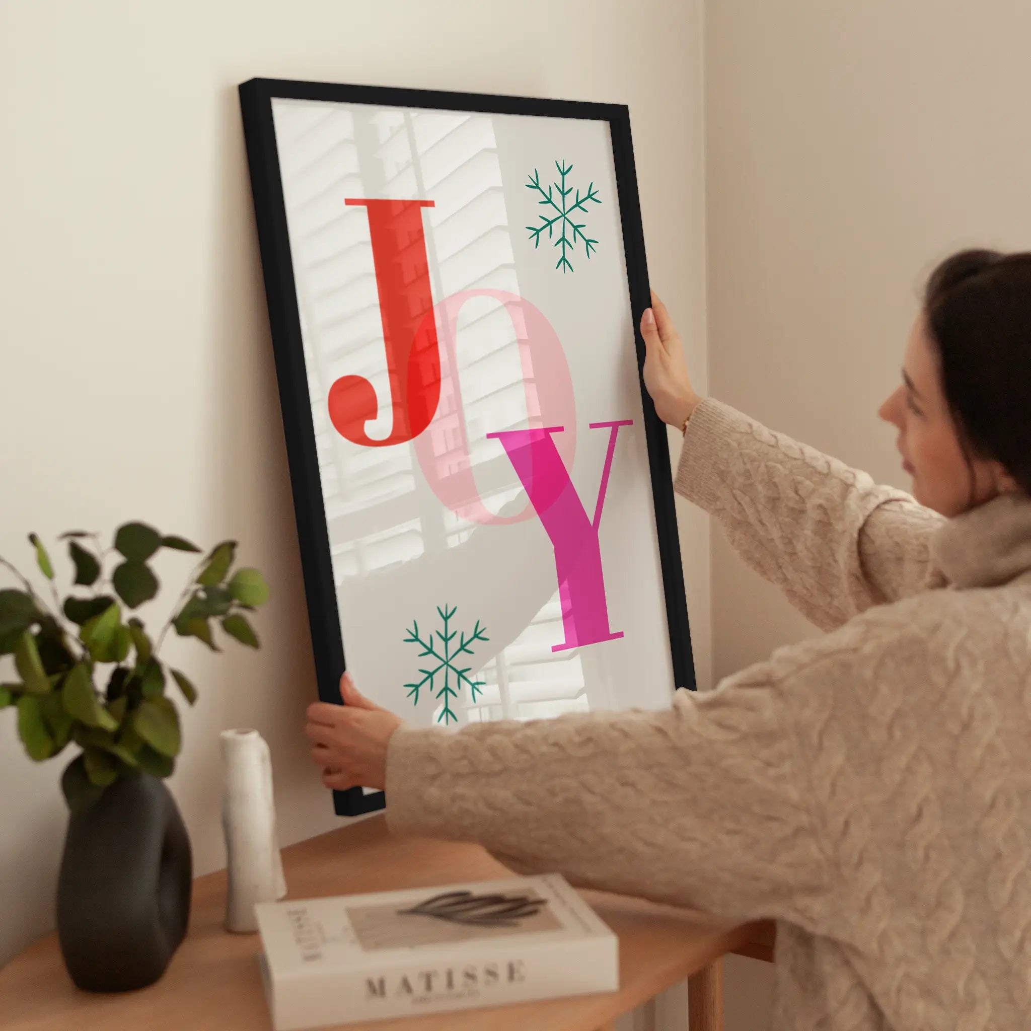 Joyful Holiday wird aufgehängt