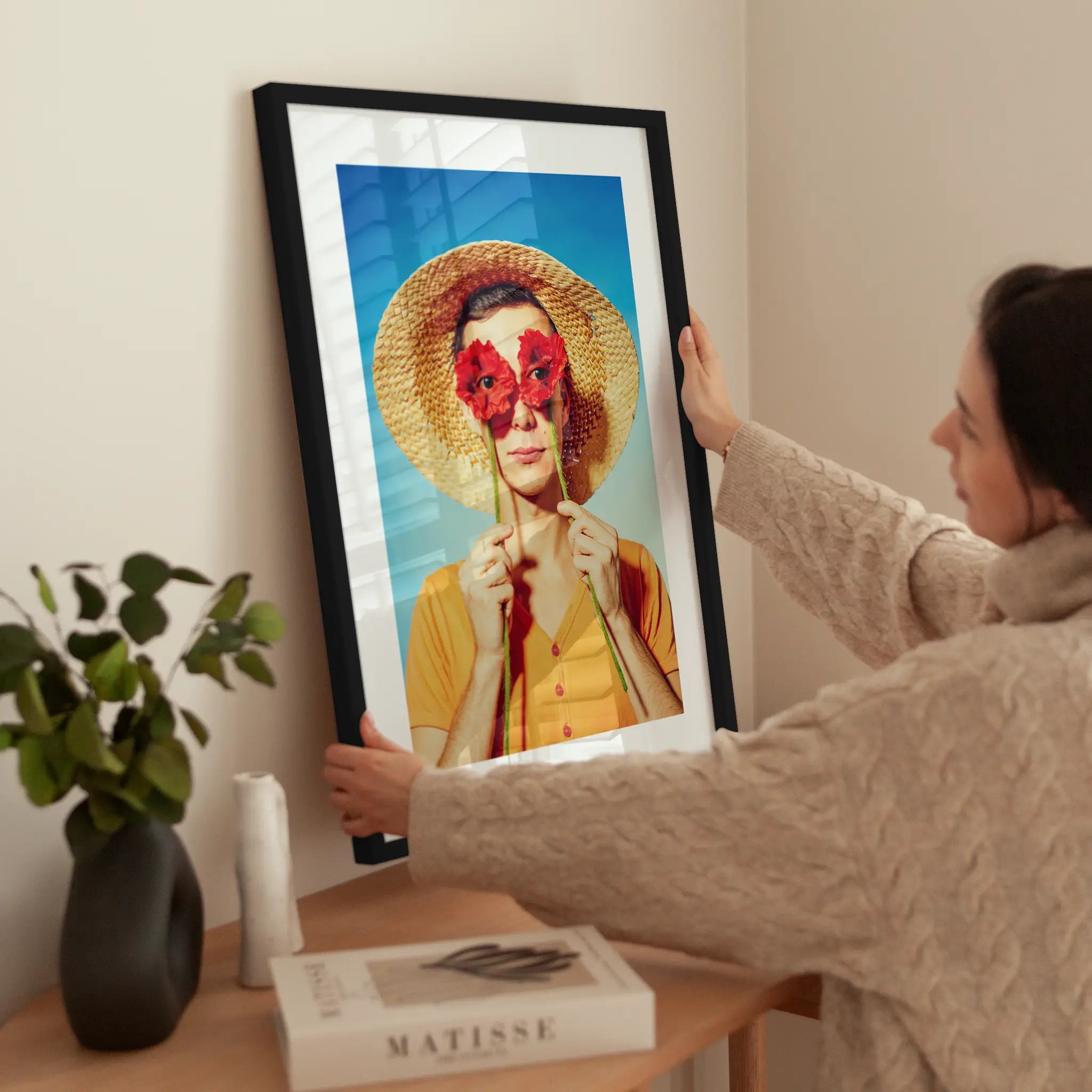 Man with Red Flowers wird aufgehängt