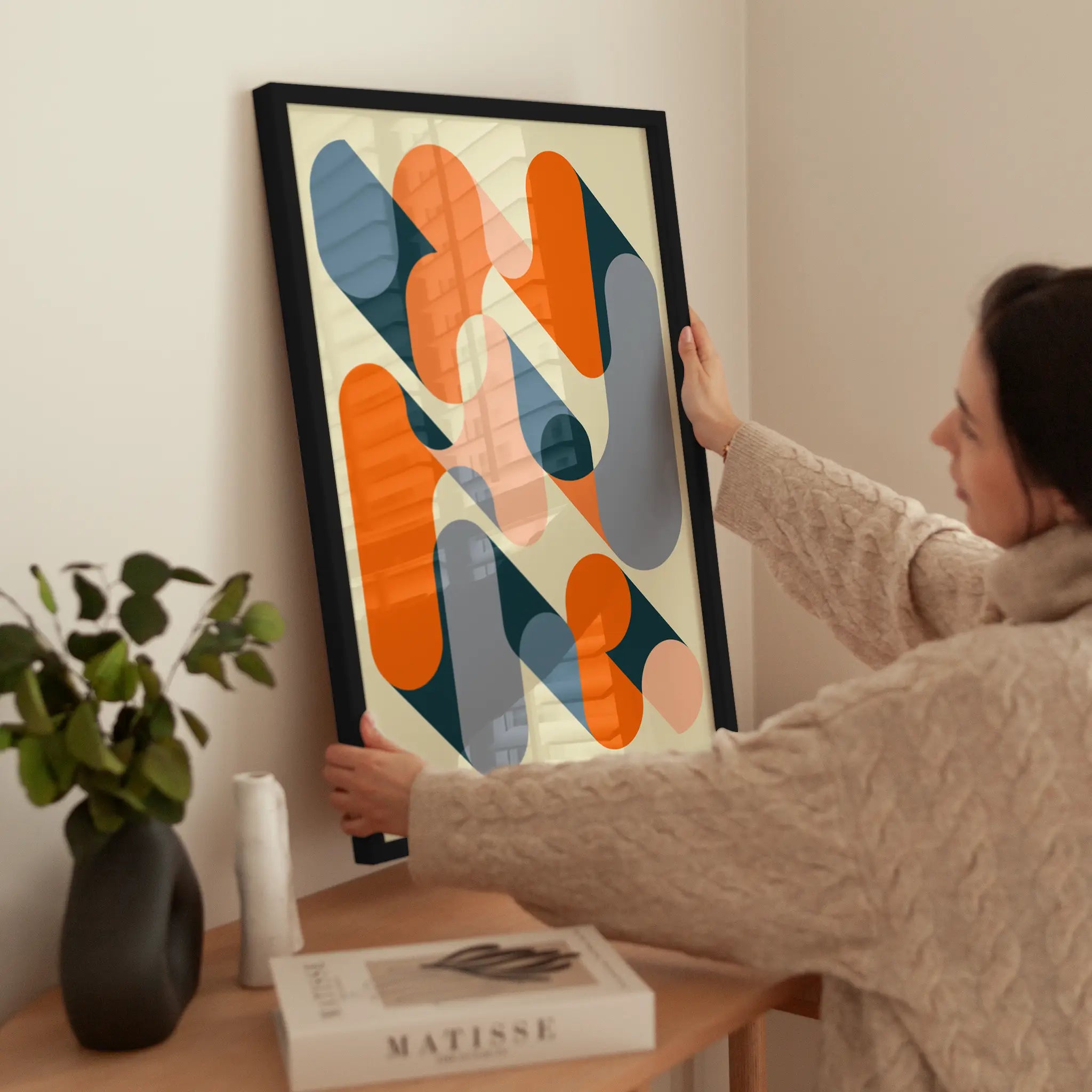 Orange Graphical Shapes wird aufgehängt