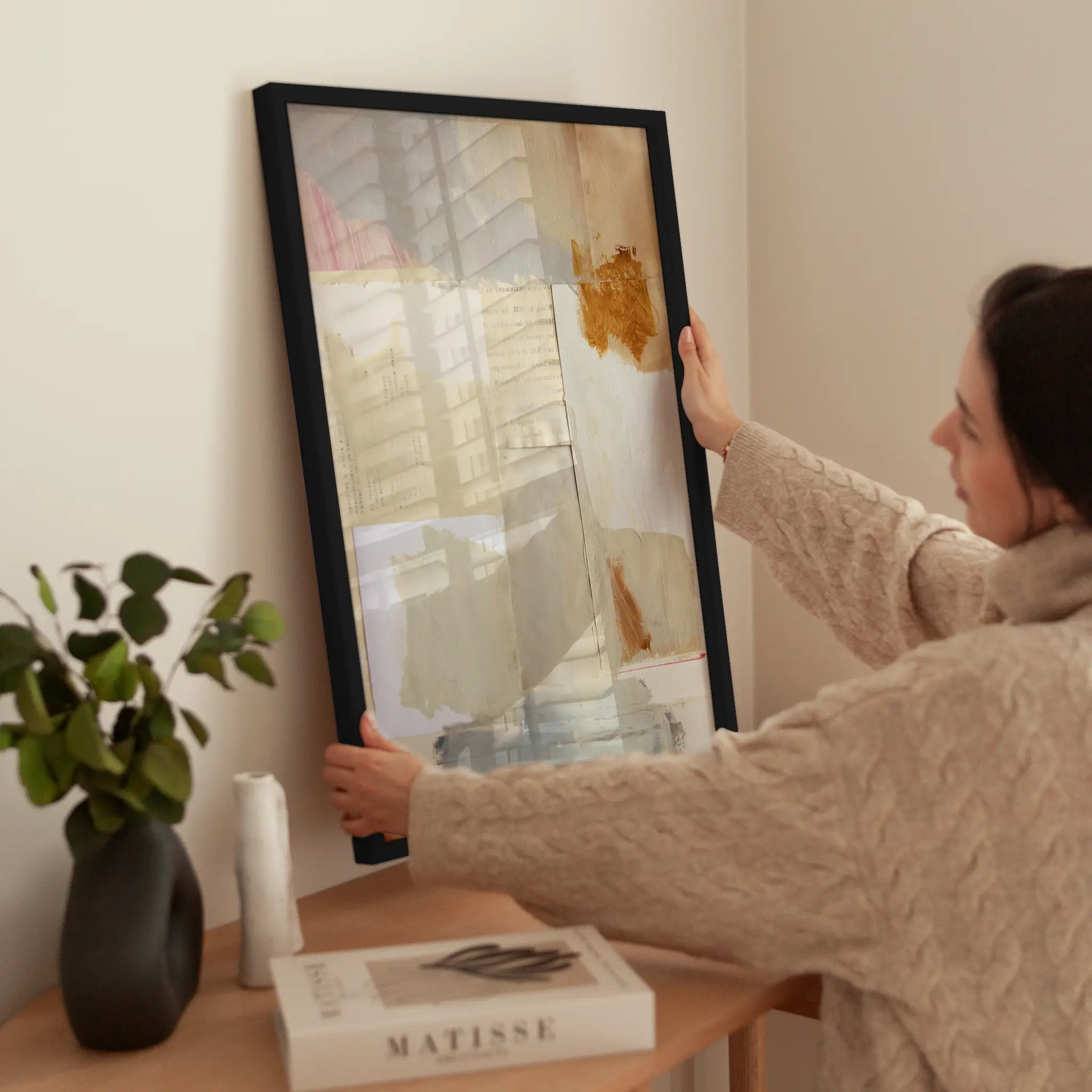 Pieces of Me Collage wird aufgehängt