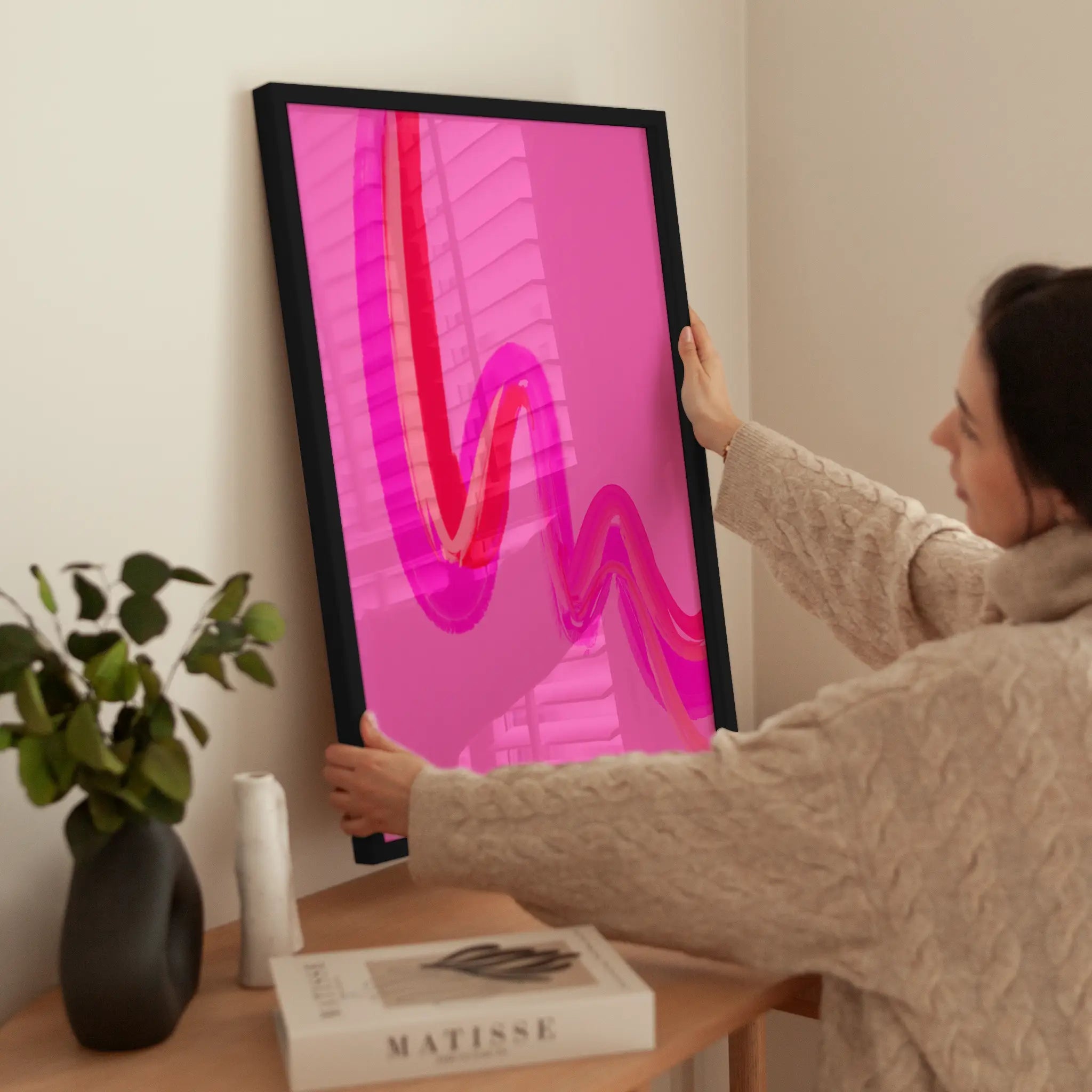 Pink and Red Wave wird aufgehängt
