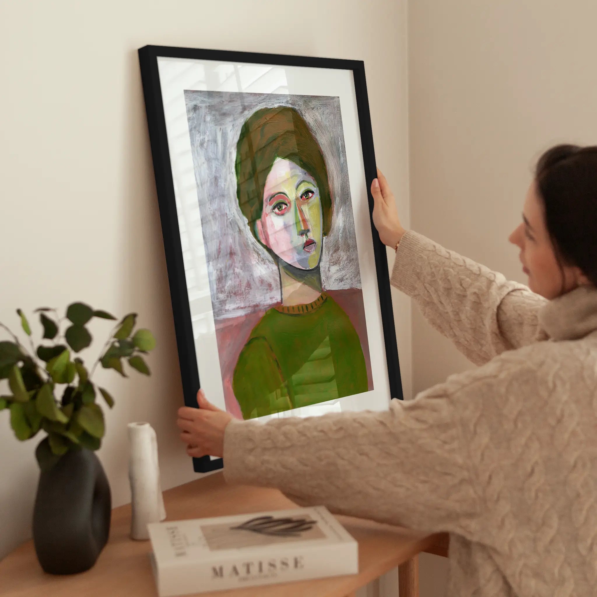 Portrait of a Woman wird aufgehängt