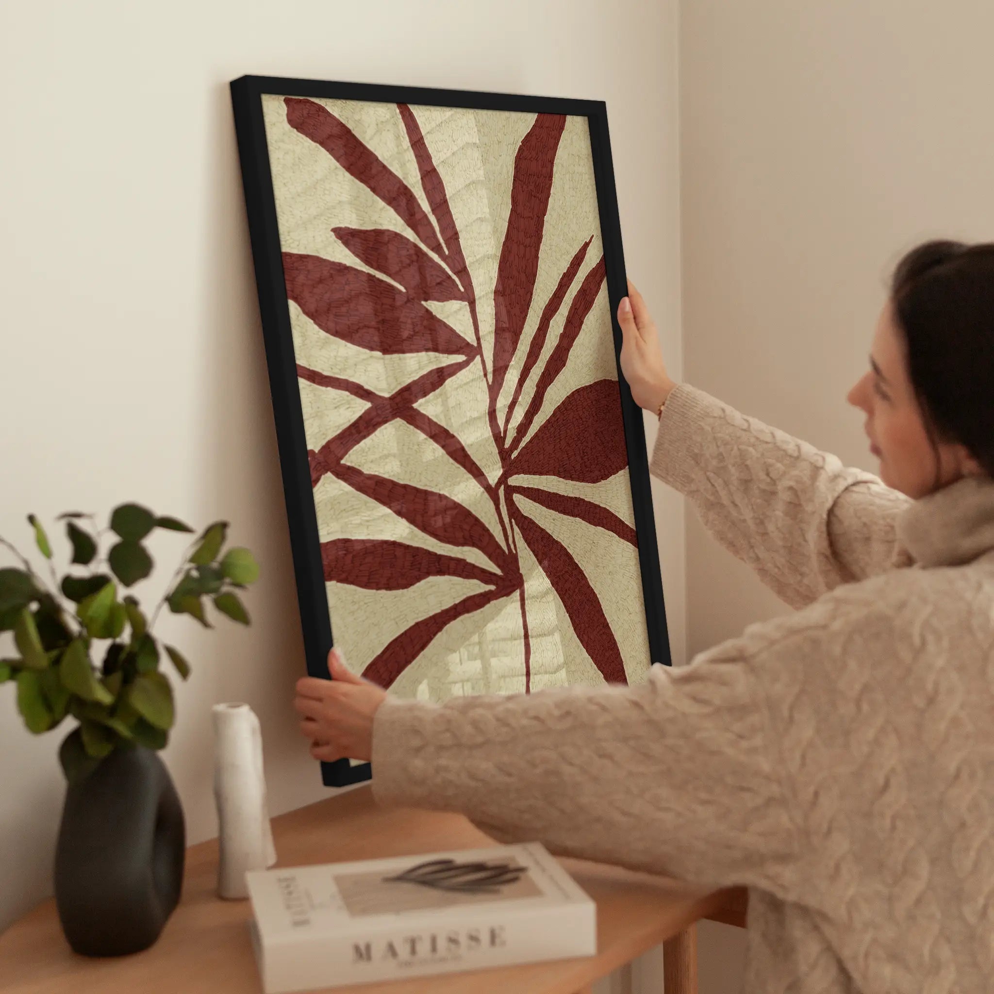 Red Leaf Silhouette wird aufgehängt