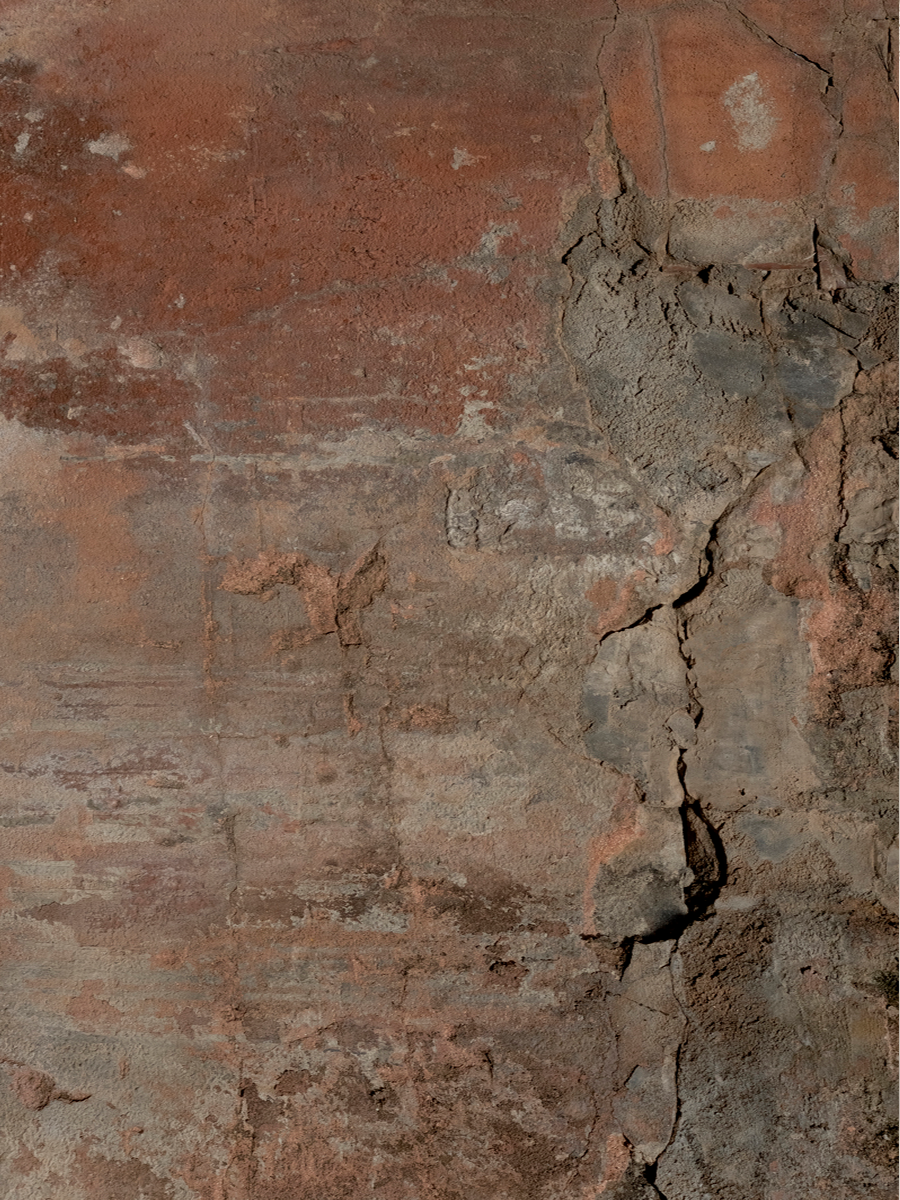 Poster mit einer rauen, rostigen Wandtextur in verschiedenen Rosttönen.