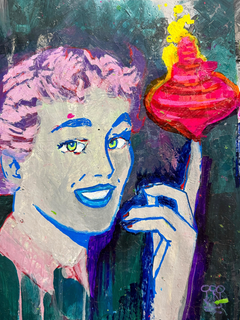 Person mit rosa Haaren hält einen rotierenden Kreisel in lebhaften Farben.