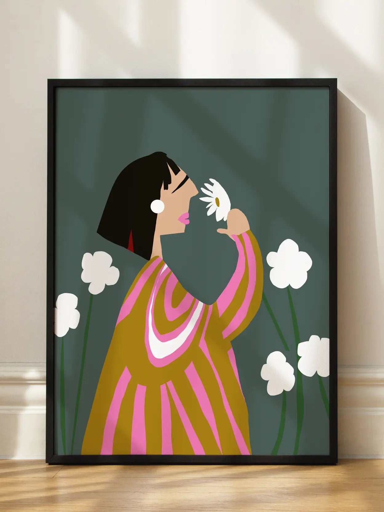 Woman Smelling A White Flower