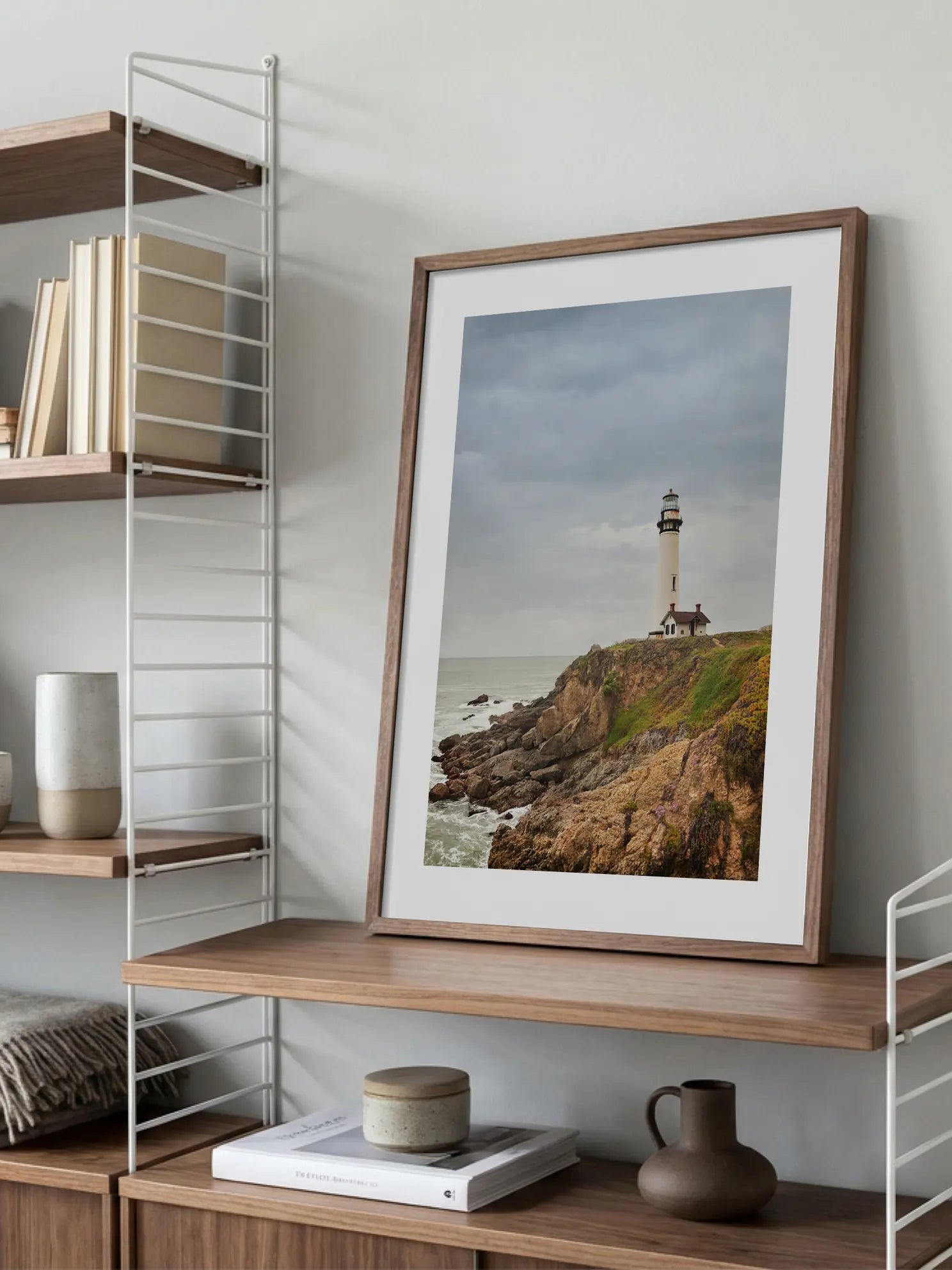 Lighthouse on a Cliff Poster