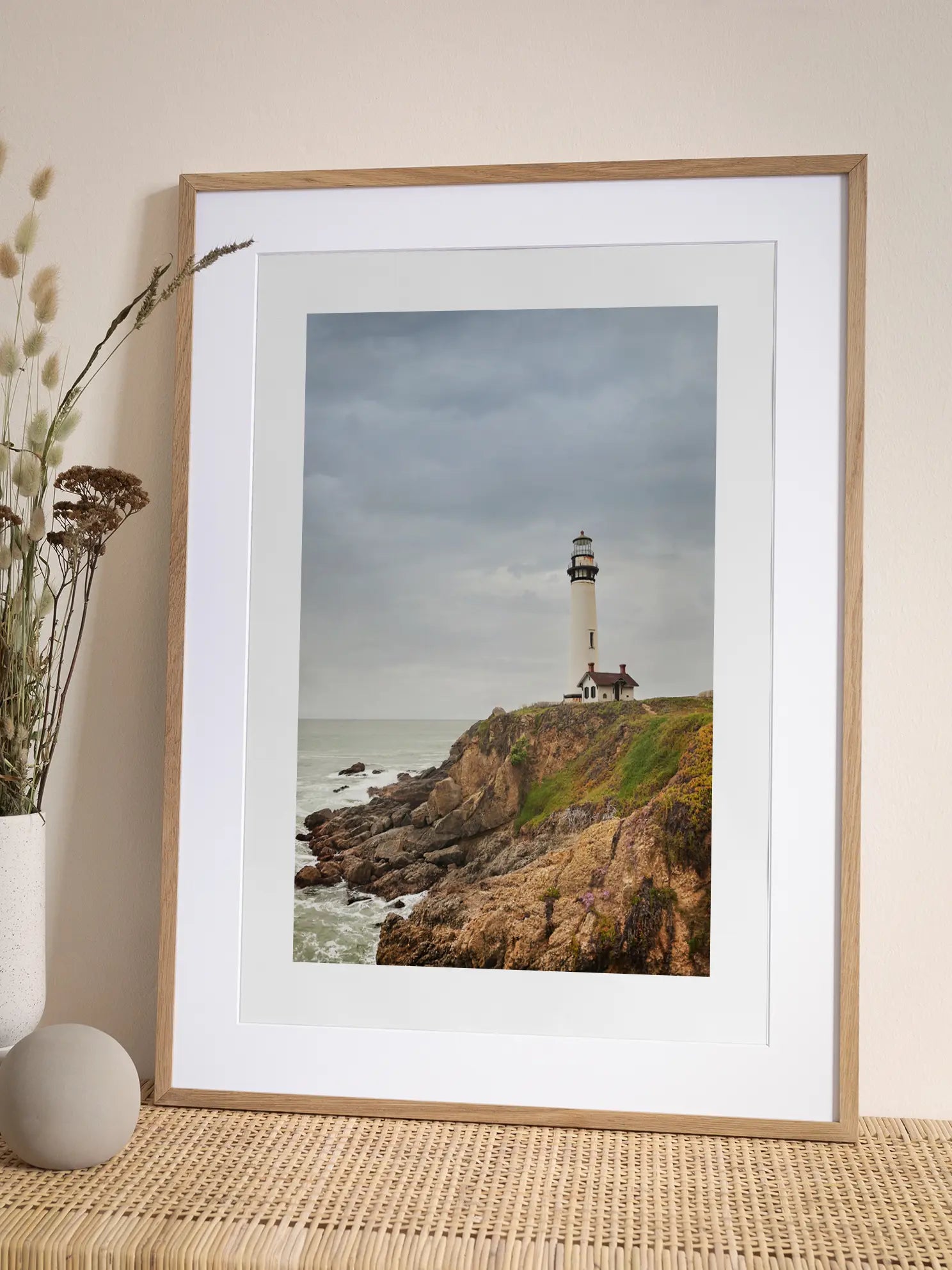 Lighthouse on a Cliff Poster