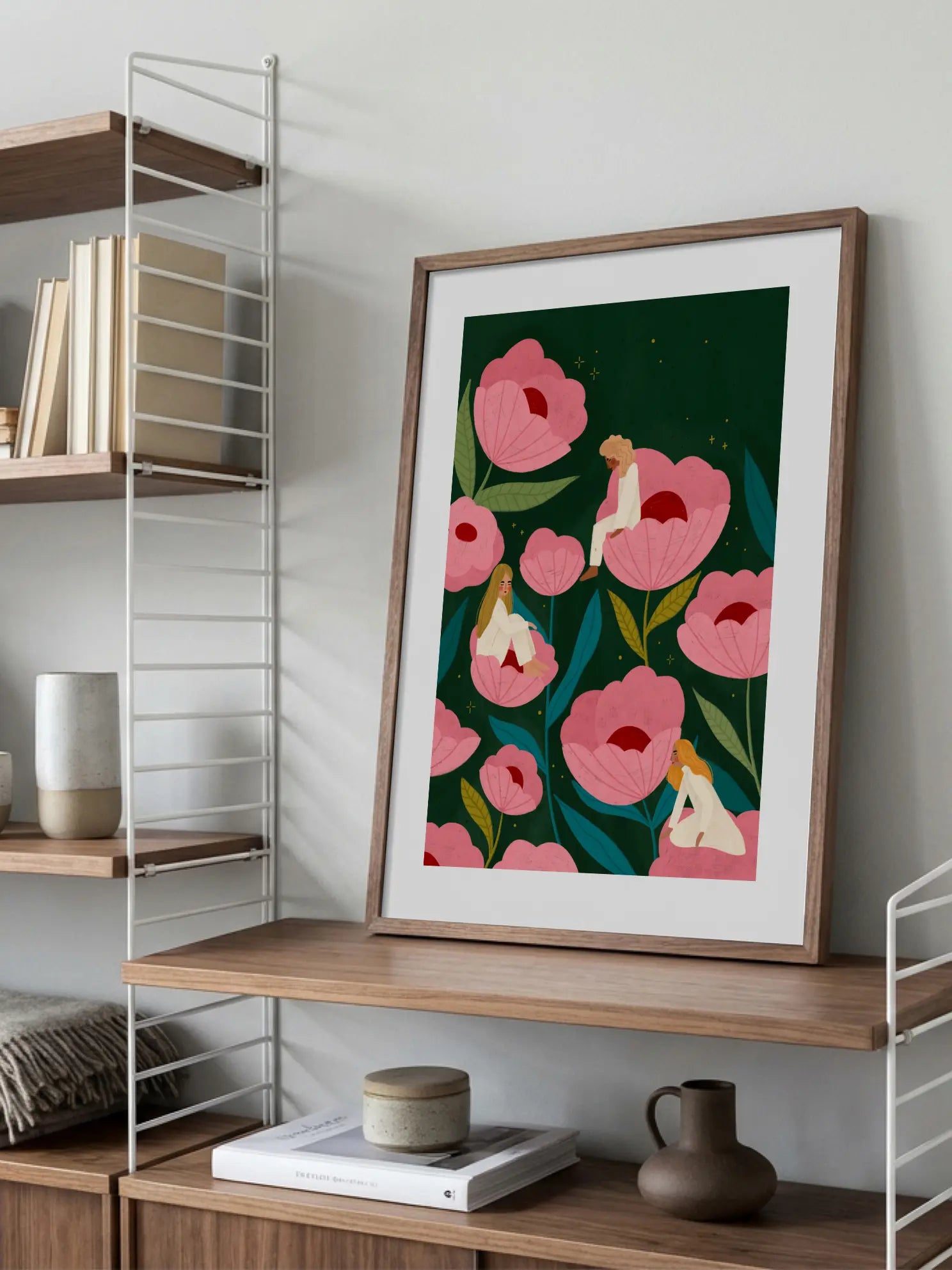 Three Women Sitting on Large Pink Flowers Poster
