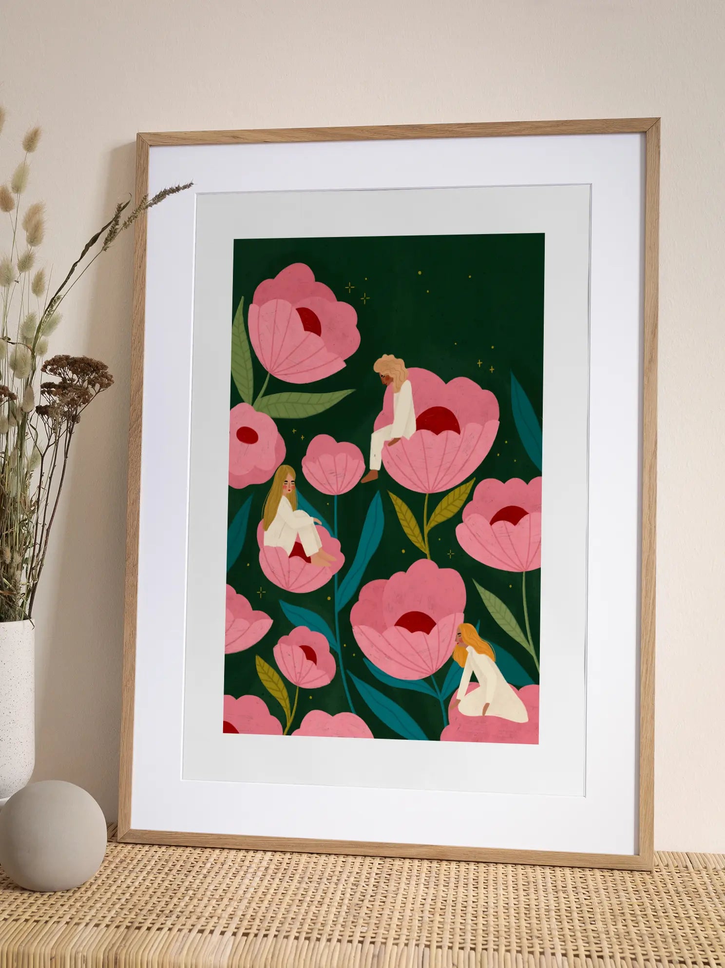 Three Women Sitting on Large Pink Flowers Poster