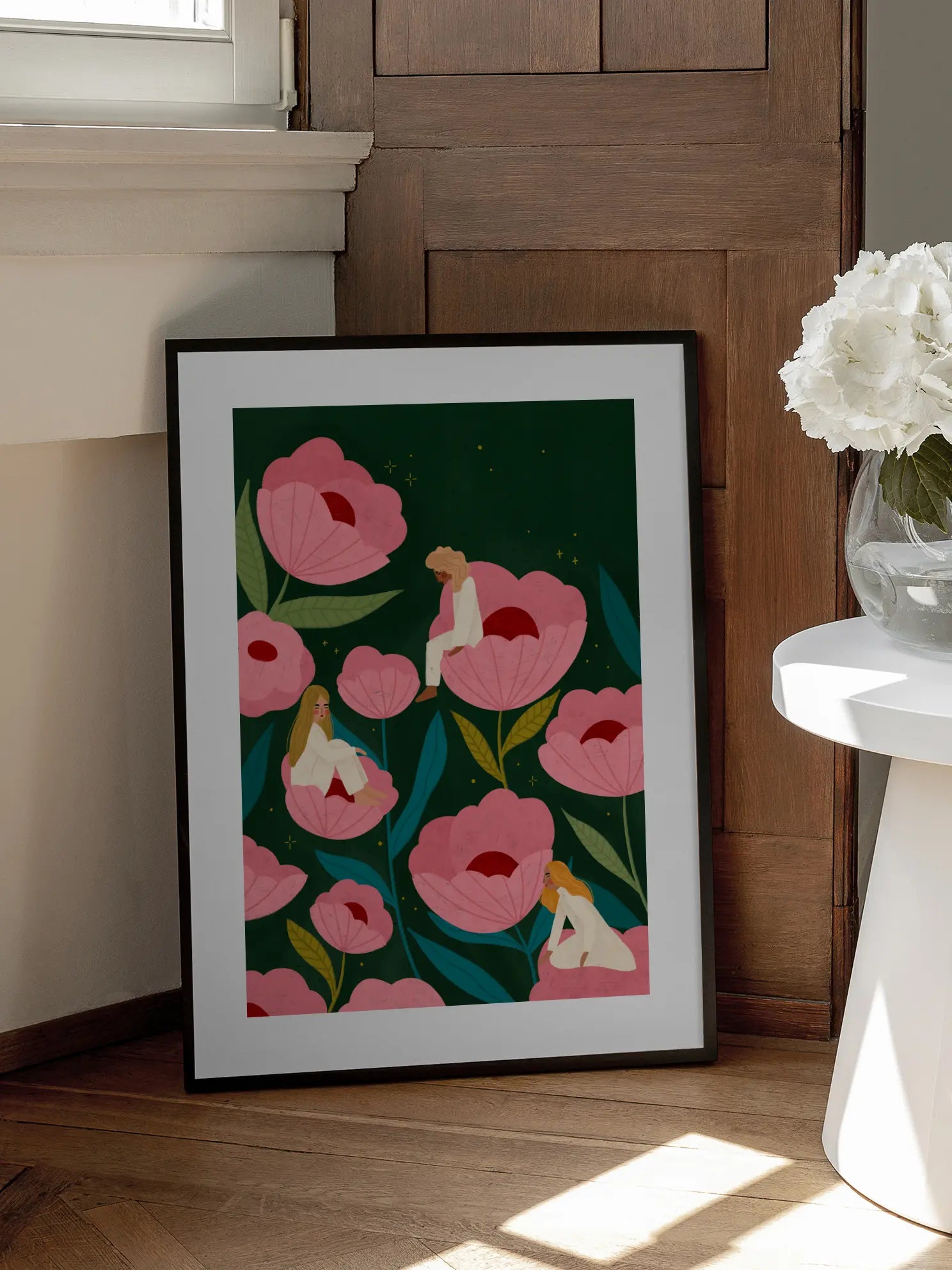 Three Women Sitting on Large Pink Flowers Poster